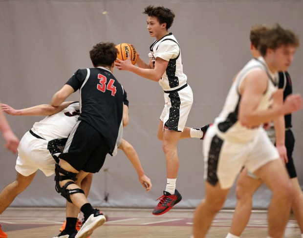 Aurora Christian's Luke Baumann (15) snags a rebound against Prophetstown in the fourth quarter during a Class 2A Aurora Christian Regional semifinal game in Aurora on Wednesday, Feb. 25, 2026.H. Rick Bamman / For the Beacon-News