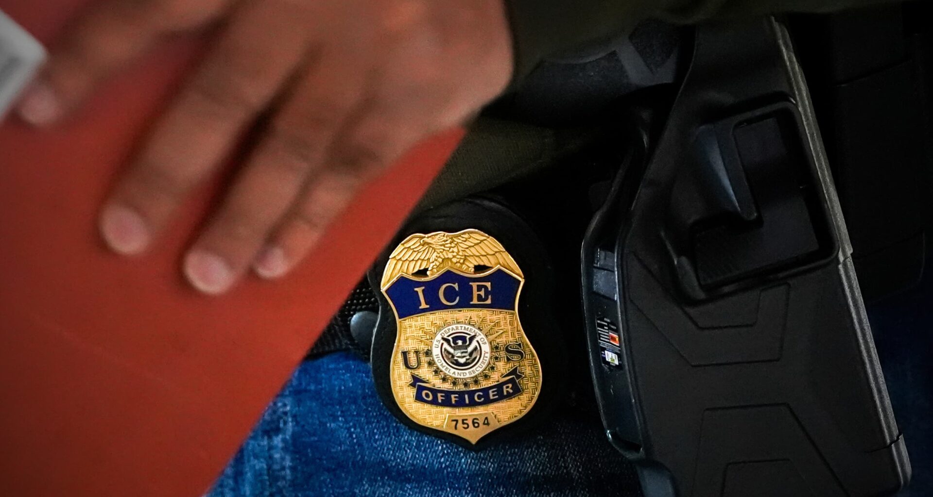 A deportation officer with U.S. Immigration and Customs Enforcement conducts a brief before an early morning operation, Dec. 17, 2024, in the Bronx borough of New York. (AP Photo/Julia Demaree Nikhinson, File)