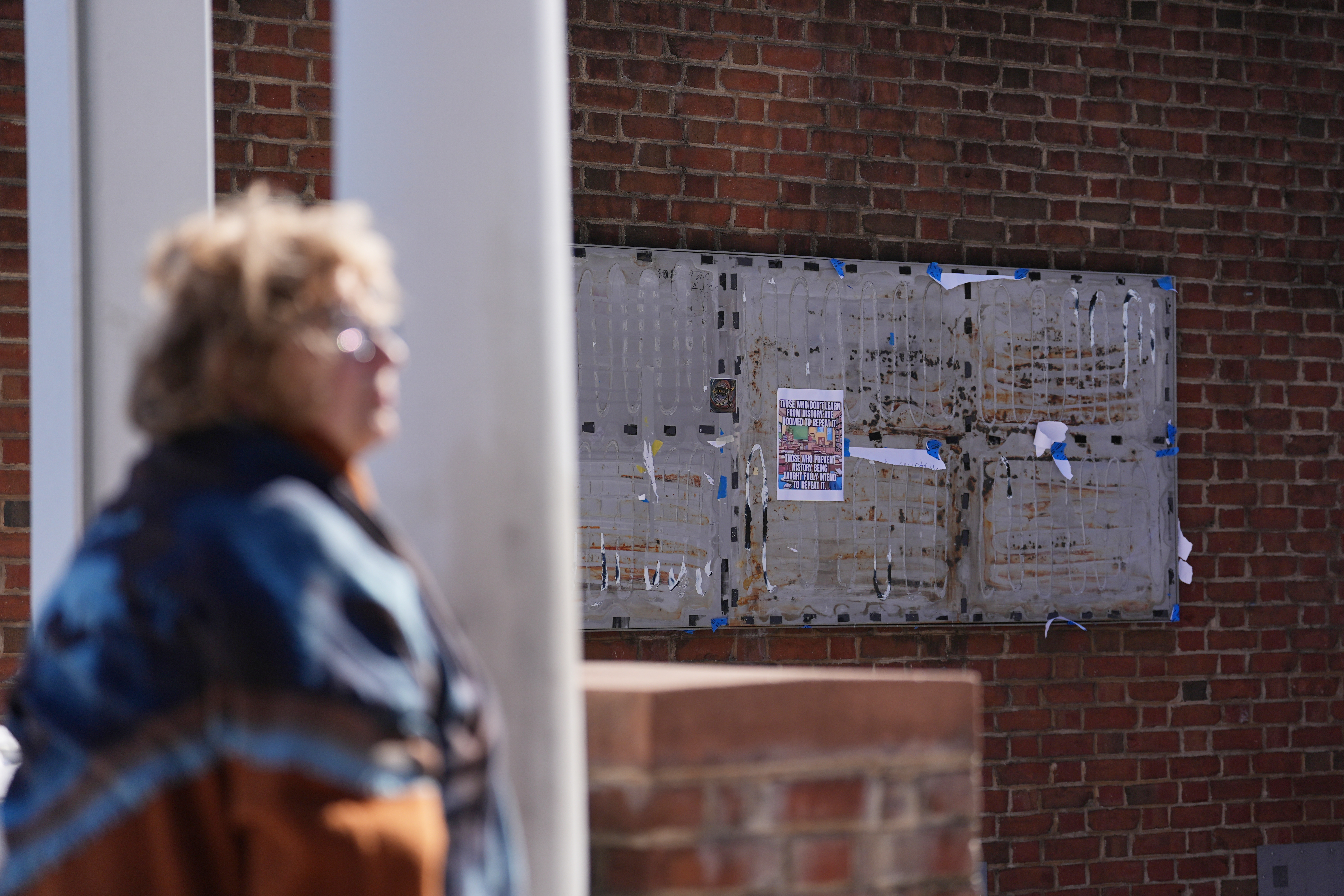 U.S. District Judge Cynthia Rufe inspects the location of the...