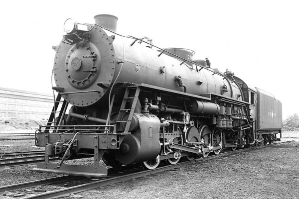 Three quarter view of front of biggest steam switcher locomotive in yard. Greenville, Pa., works to save depot.