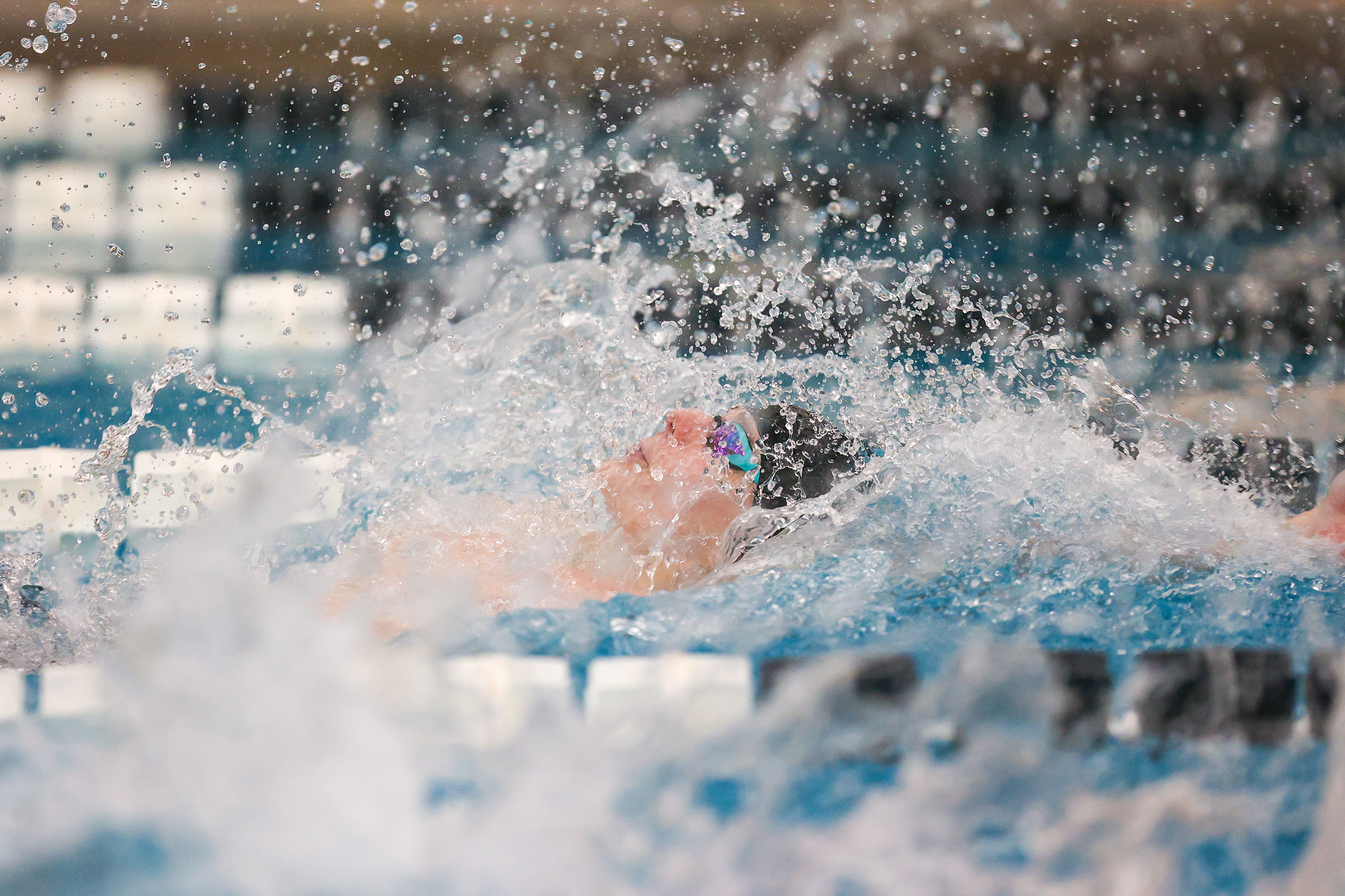 Tunkhannock Area’s Kyle Kozloski swims the backstroke leg of the...