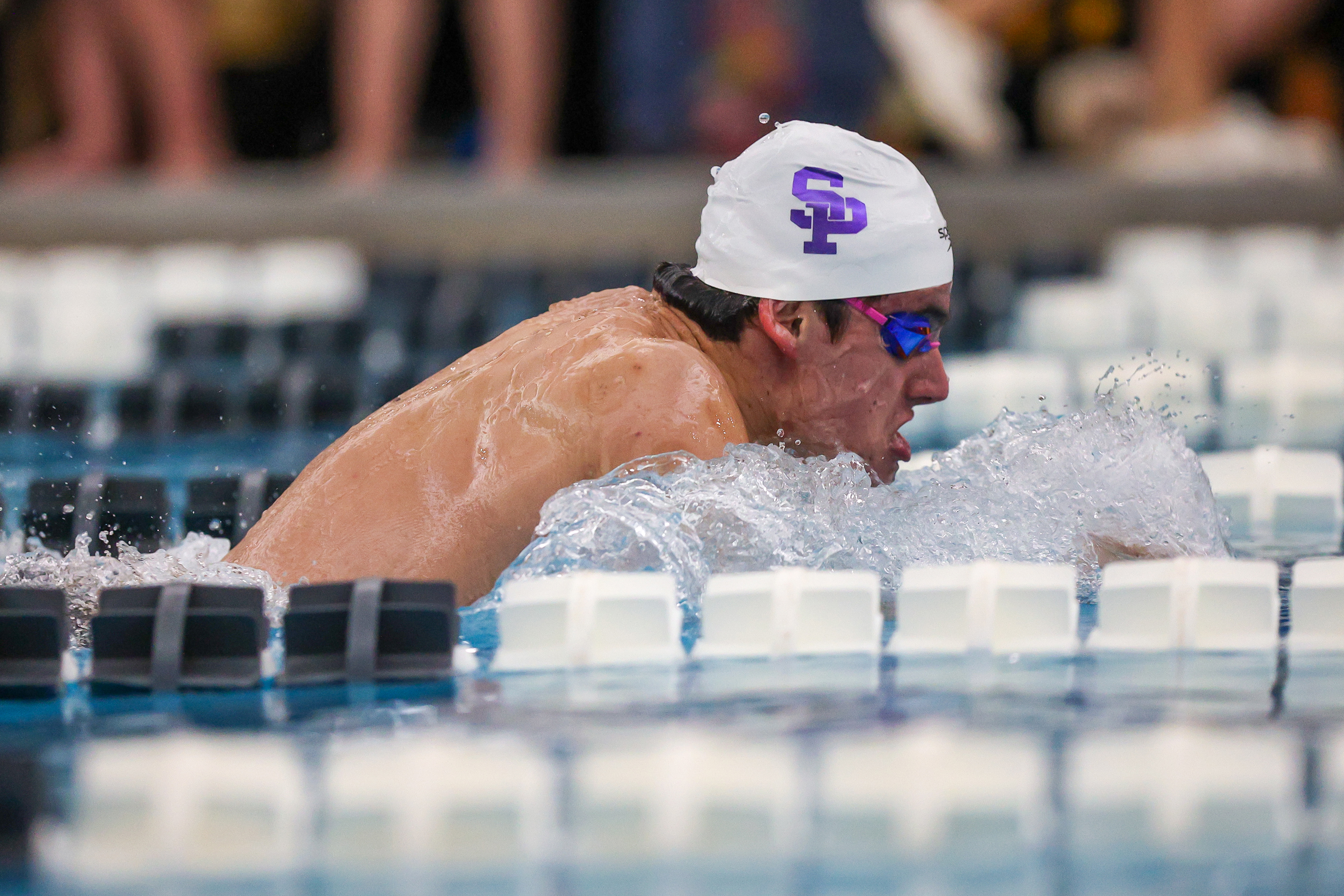 Scranton Prep’s Lukas Iannone swims the breaststroke leg of the...