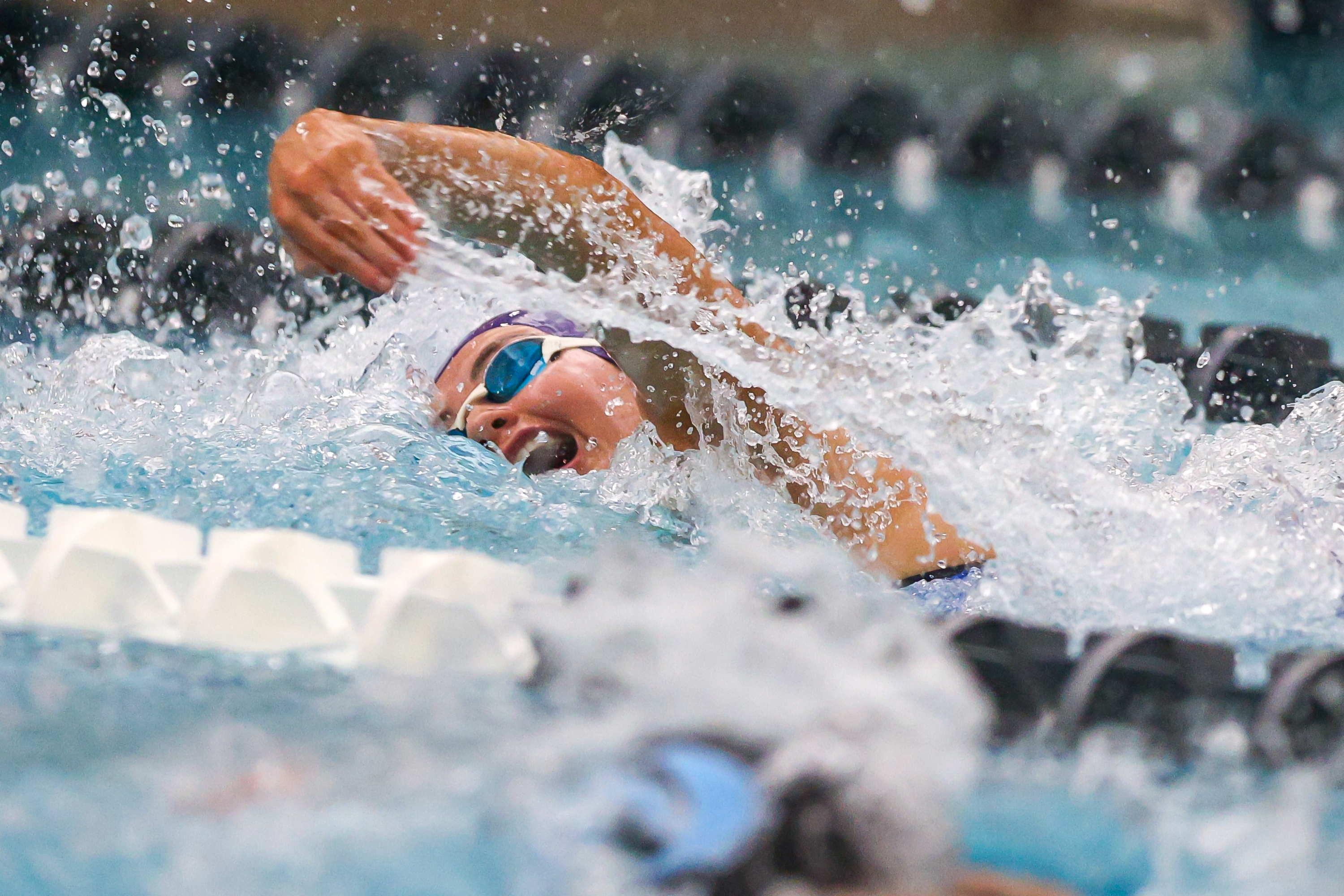 Scranton Prep’s Eva Kaszuba swims the first leg of the...
