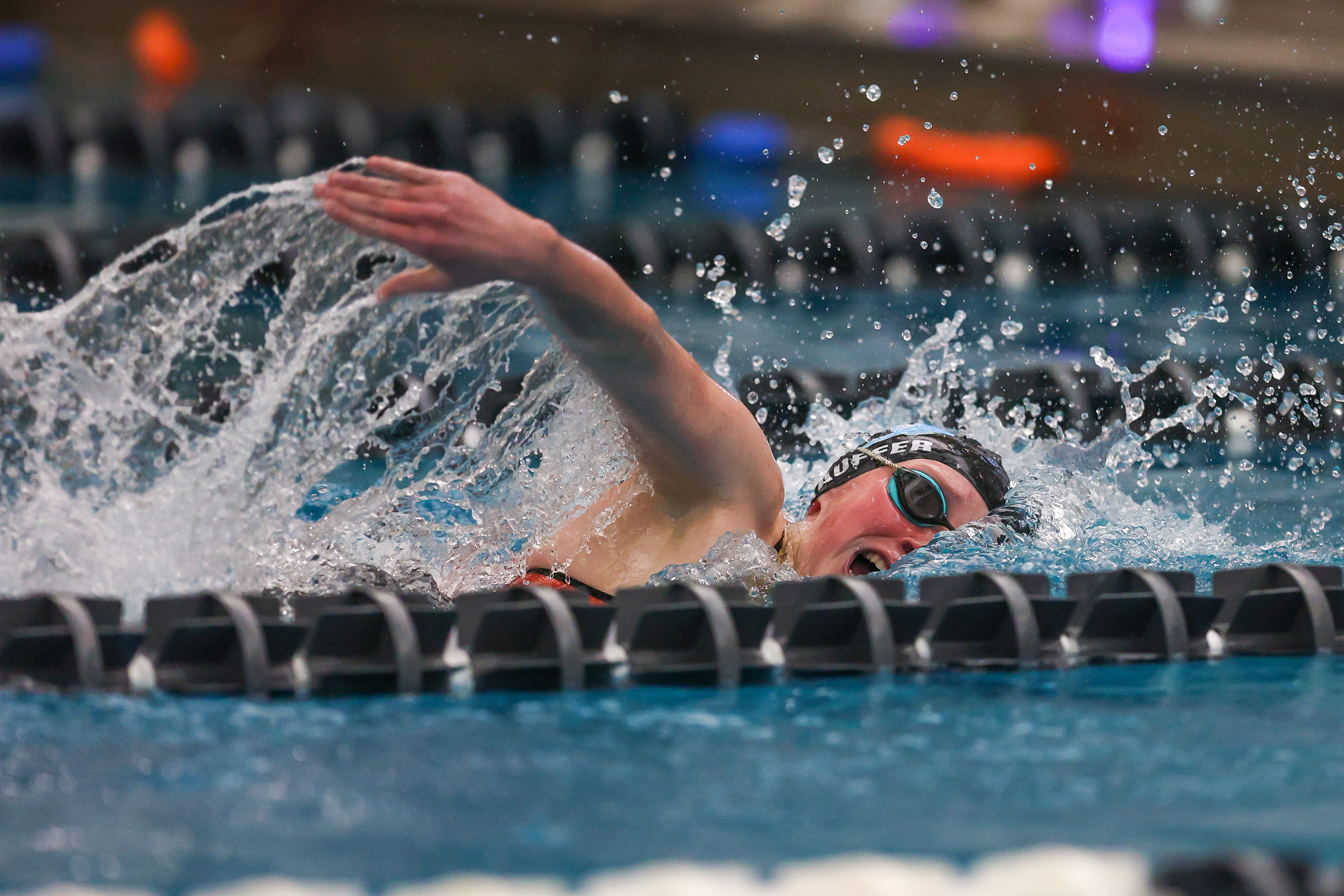 Dallas’ Macie Stauffer swims the 200 freestyle during the District...