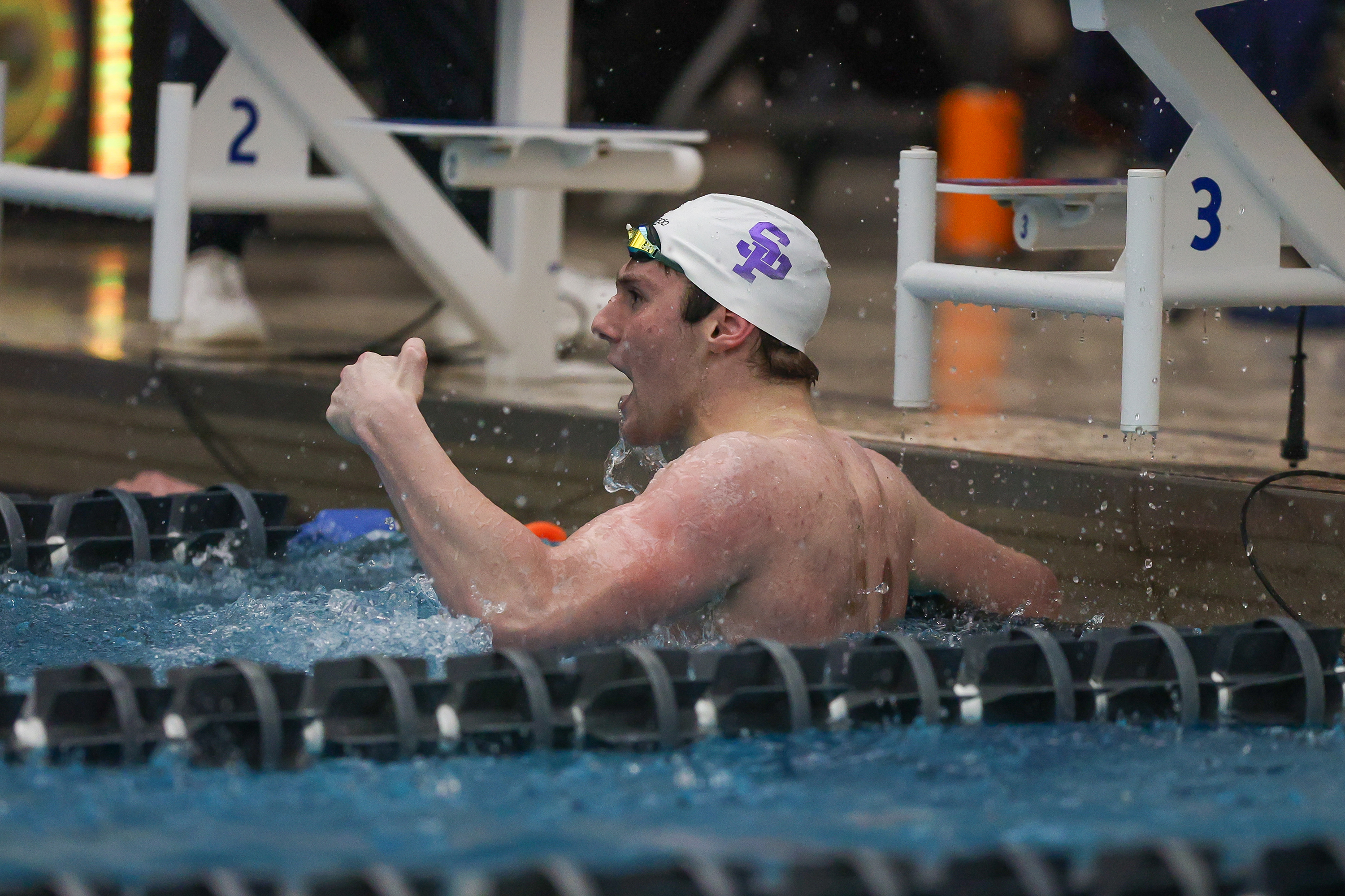 Scranton Prep’s Ben Kessler celebrates after winning the 200 freestyle...