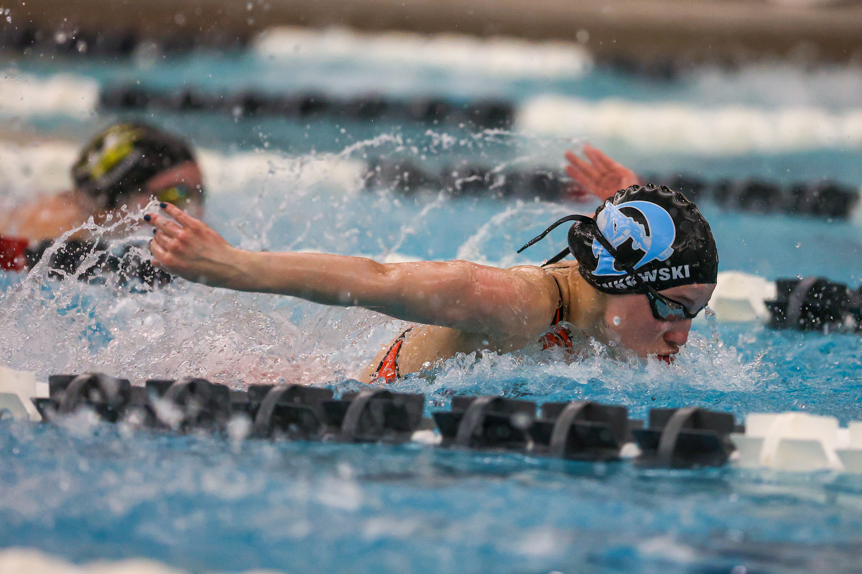 Dallas’ Locklynn Bienkowski swims the butterfly leg of the 200...