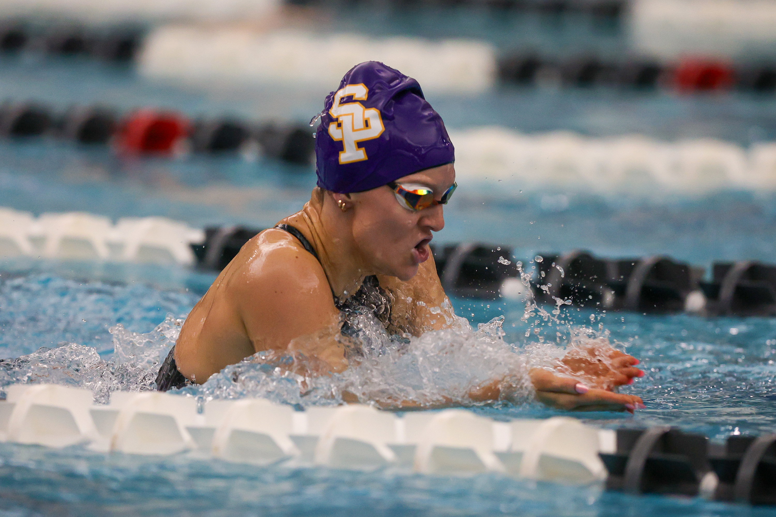 Scranton Prep’s Ella Schofield swims the breaststroke leg of the...