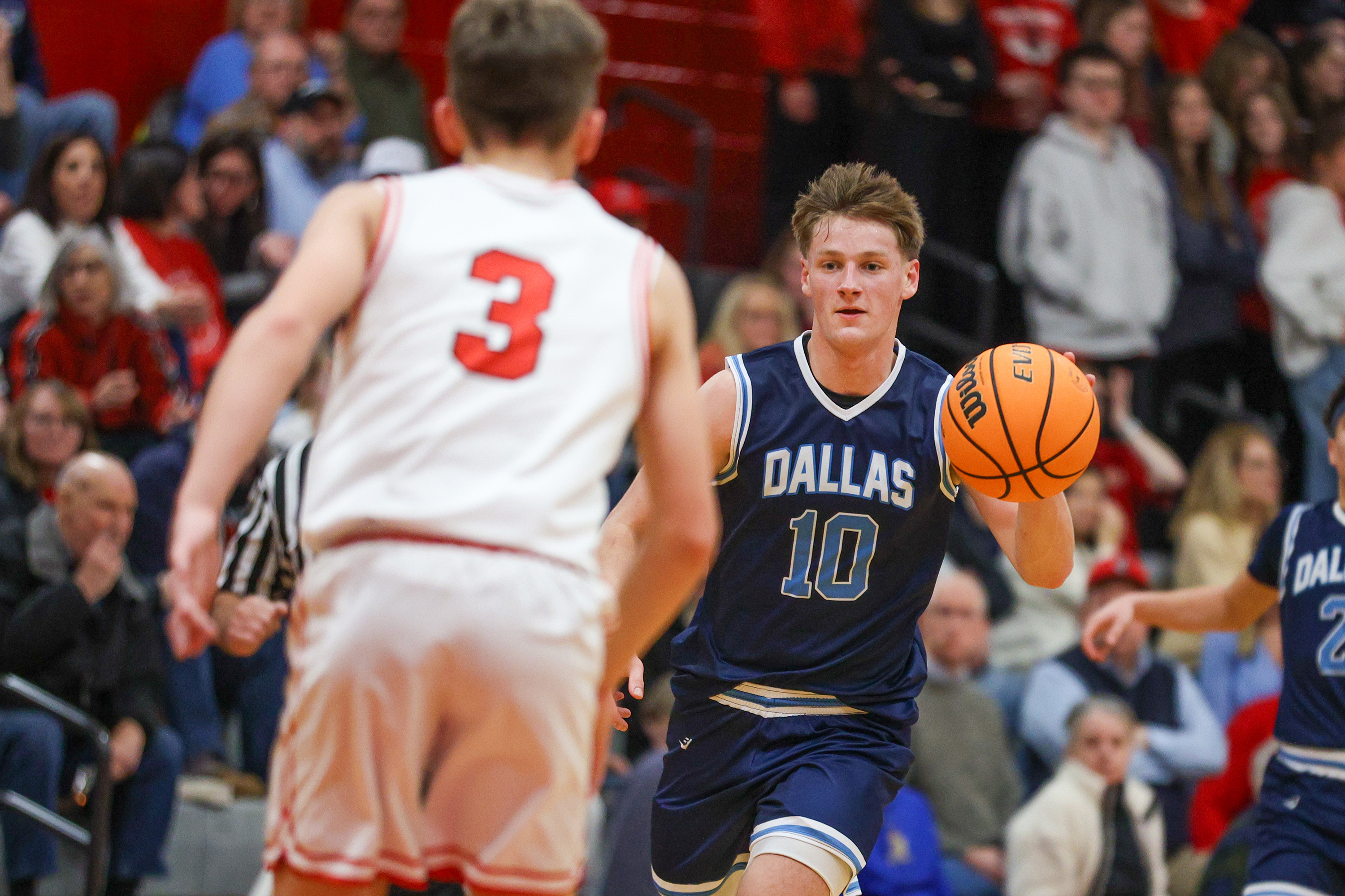Dallas’ Pat Flanagan (10) dribbles toward the basket during a...