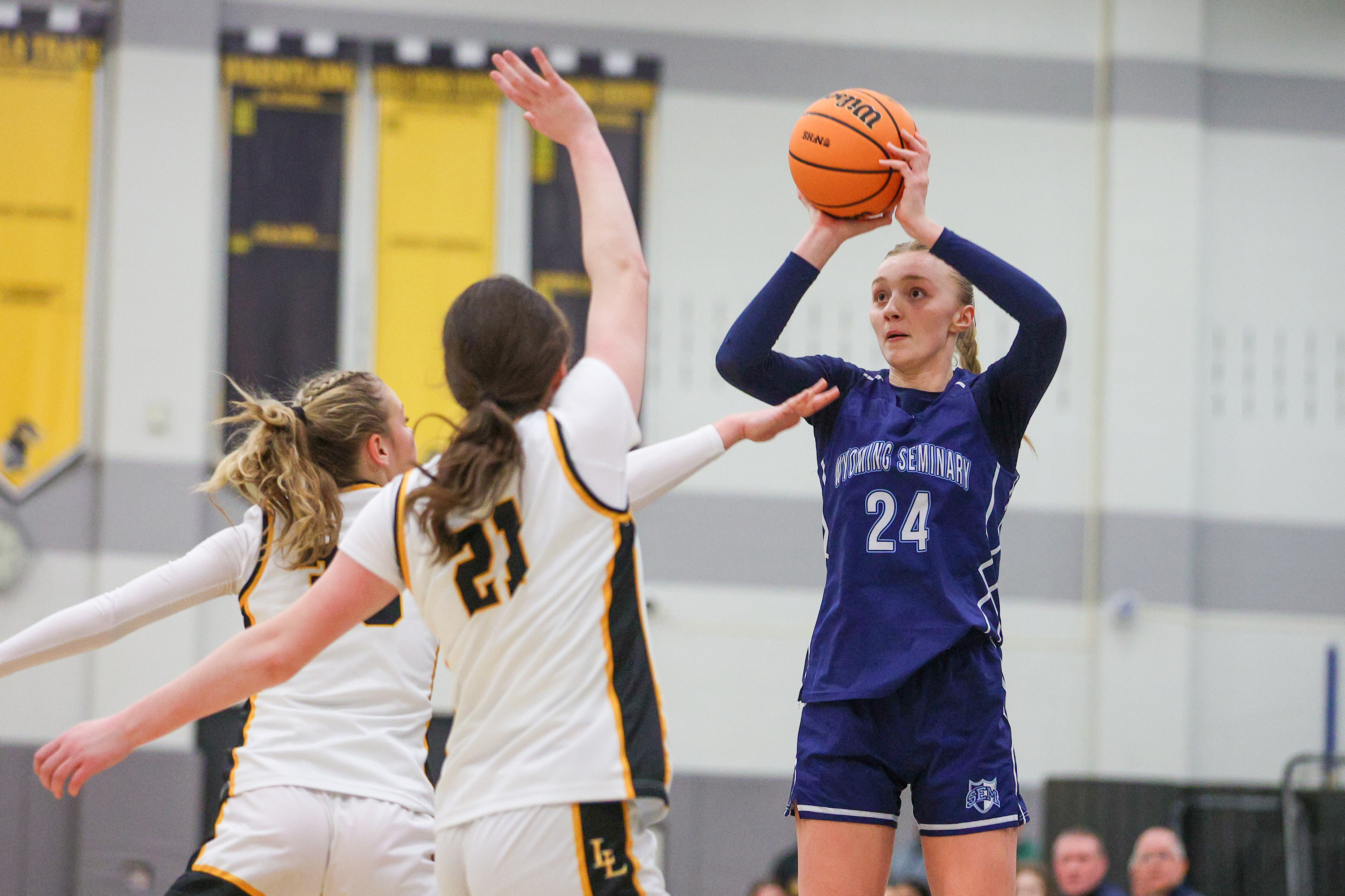 Wyoming Seminary’s Ella Stambaugh (24) takes a three-point shot during...