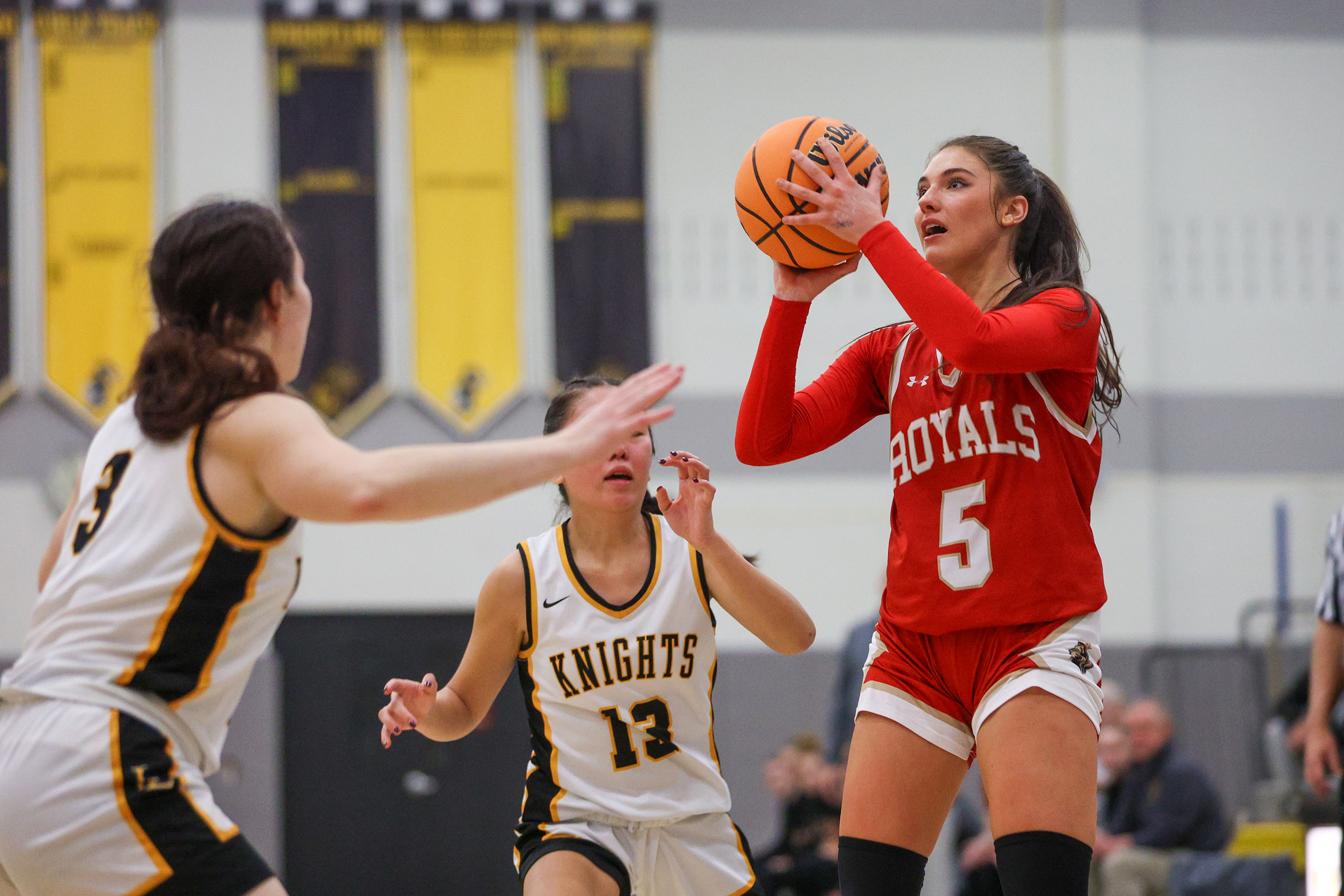 Holy Redeemer’s Bella Boylan (5) takes a shot during a...
