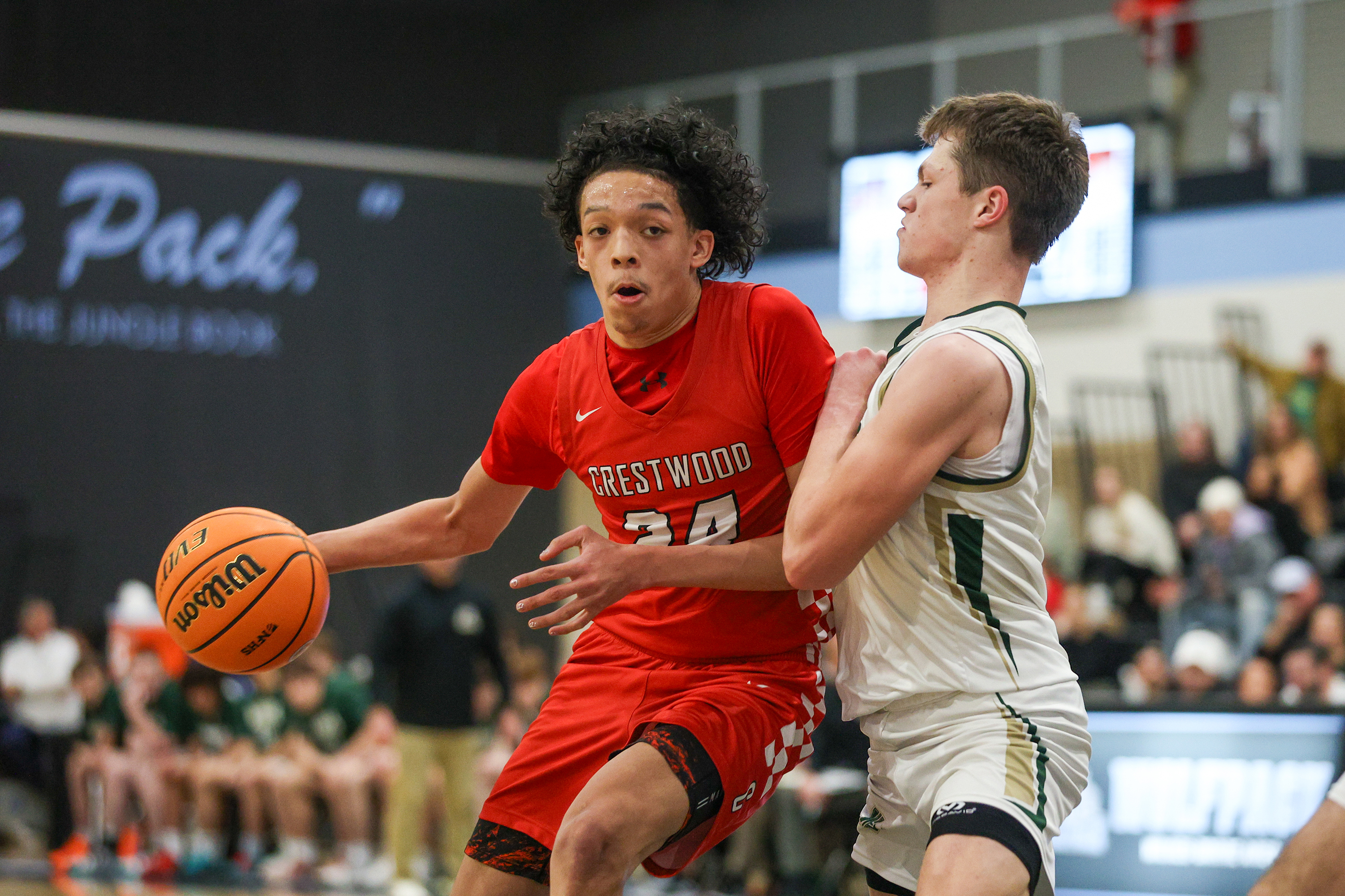 Crestwood’s Ayden Agapito (24) drives toward the basket during a...