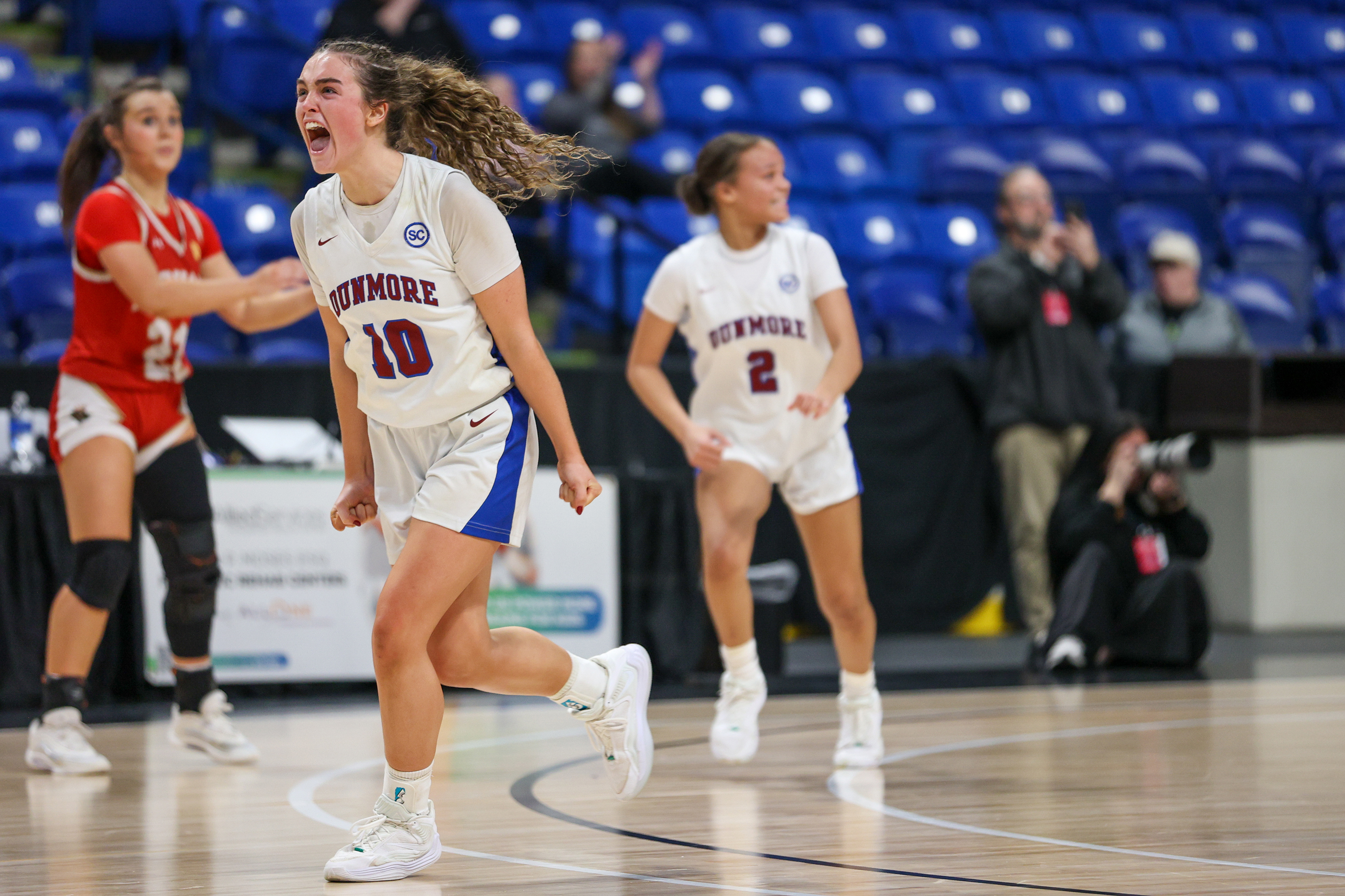 Dunmore’s Amanda Dempsey (10) celebrates after teammate Janaya Martin made...