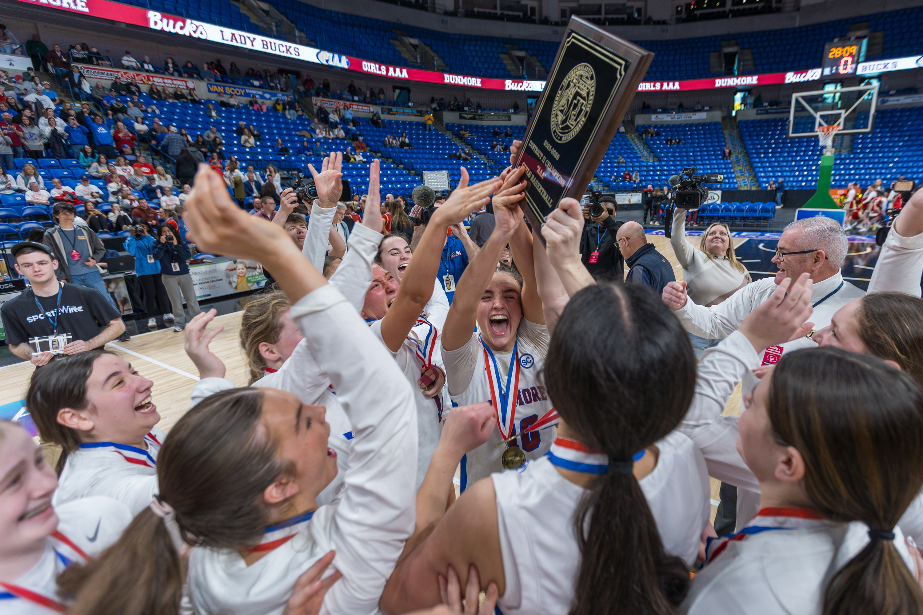 Dunmore celebrates after winning the District 2 Class 3A girls...