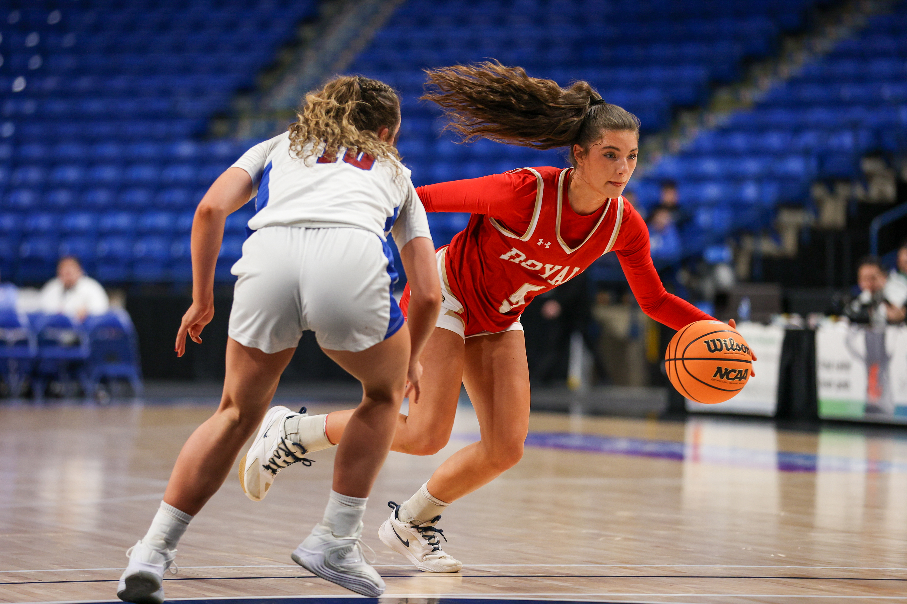 Holy Redeemer’s Bella Boylan (5) drives toward the basket during...