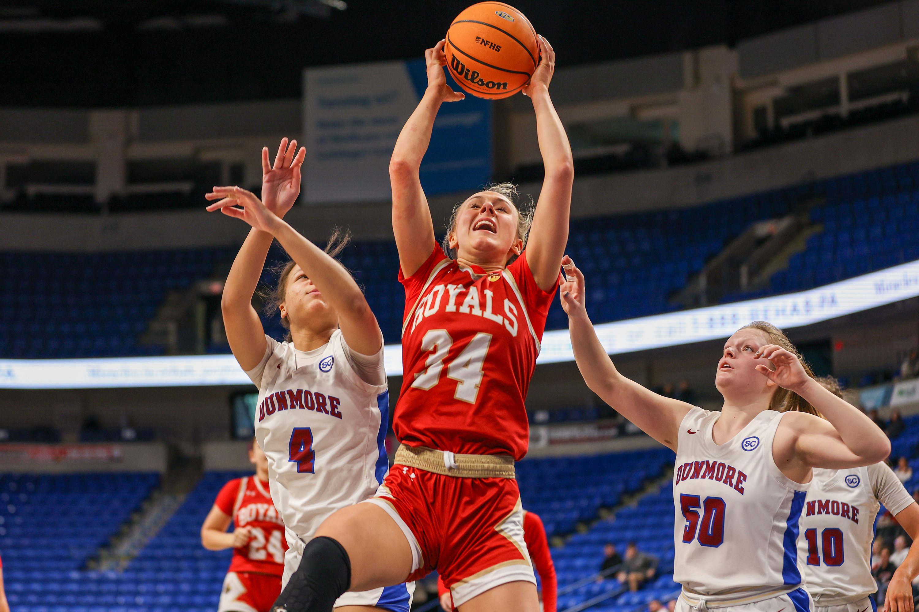 Holy Redeemer’s Gillian Parsons (34) grabs a rebound during the...