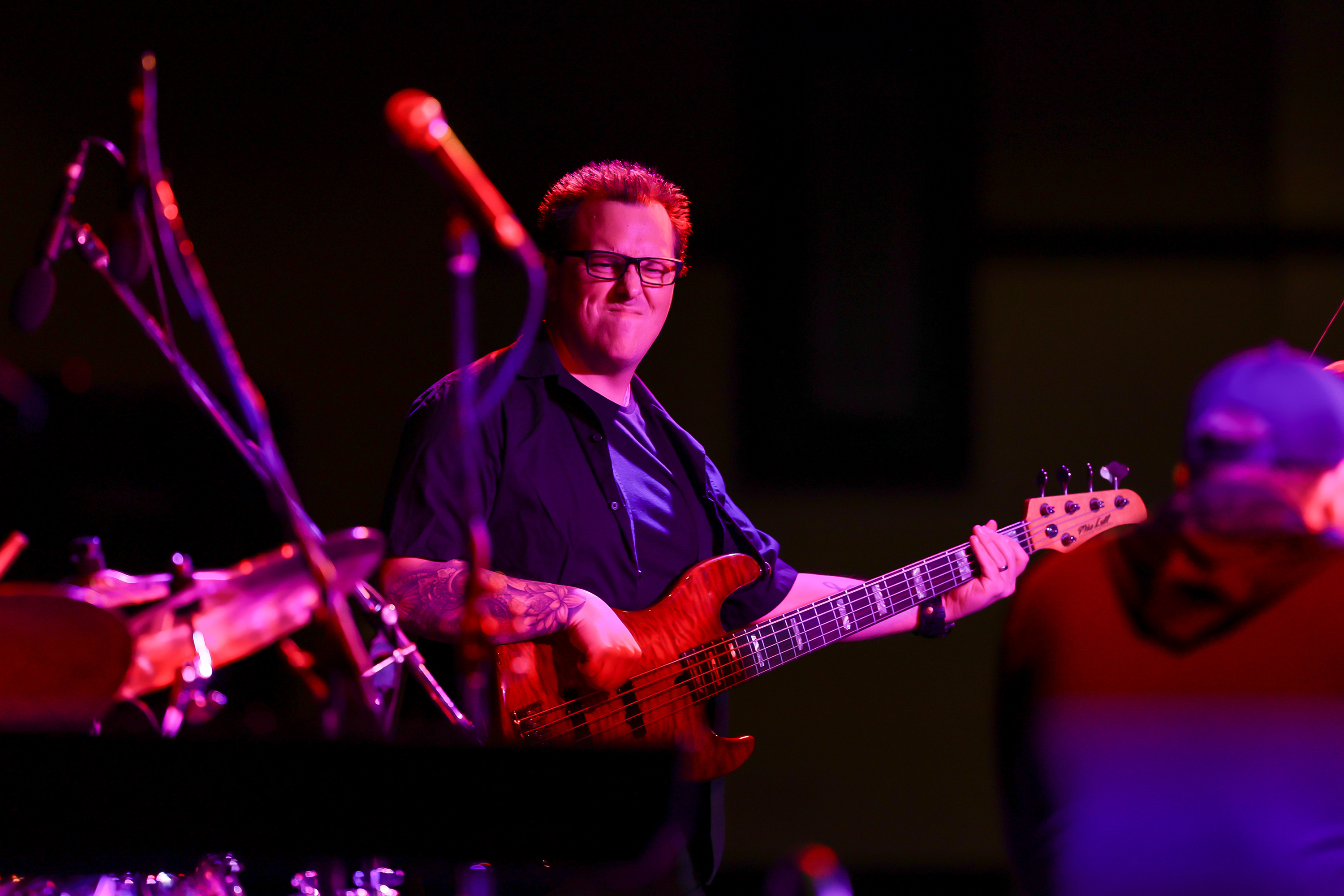 Jon Ventre, bassist for ‘Rogue Chimp,’ jams out during the...