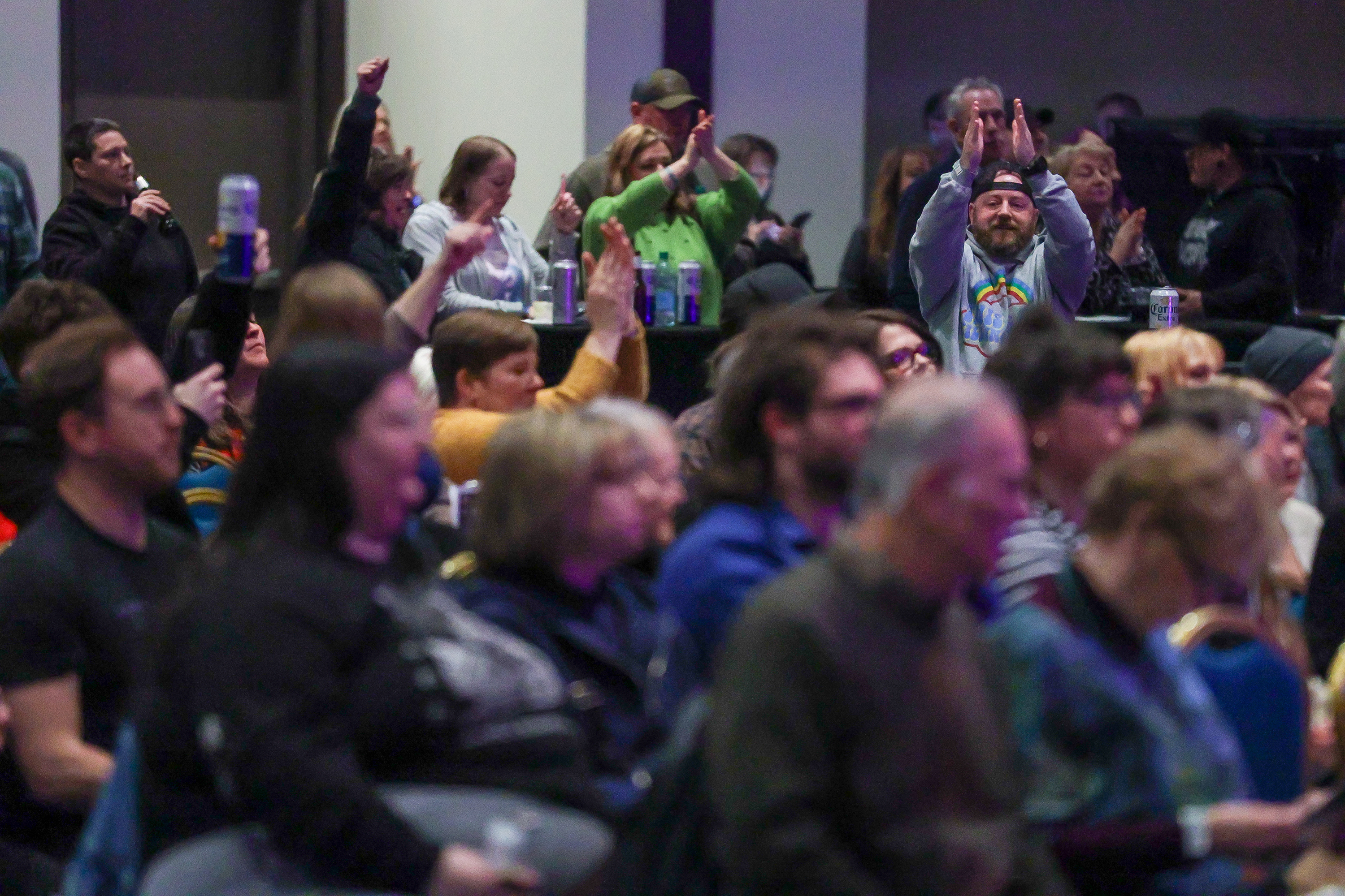 The crowd claps along during a song performed at the...