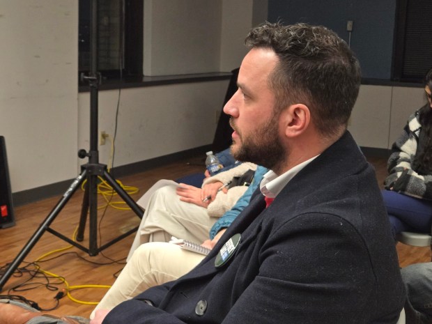 Jeffrey Lake, a candidate challenging Democratic state Sen. Marty Flynn for his seat in the 22nd Senatorial District, poses a question to the panel during a community roundtable on rising energy costs Tuesday in the Luzerne Bank building in Wilkes-Barre. (STEVE MOCARSKY / STAFF PHOTO)