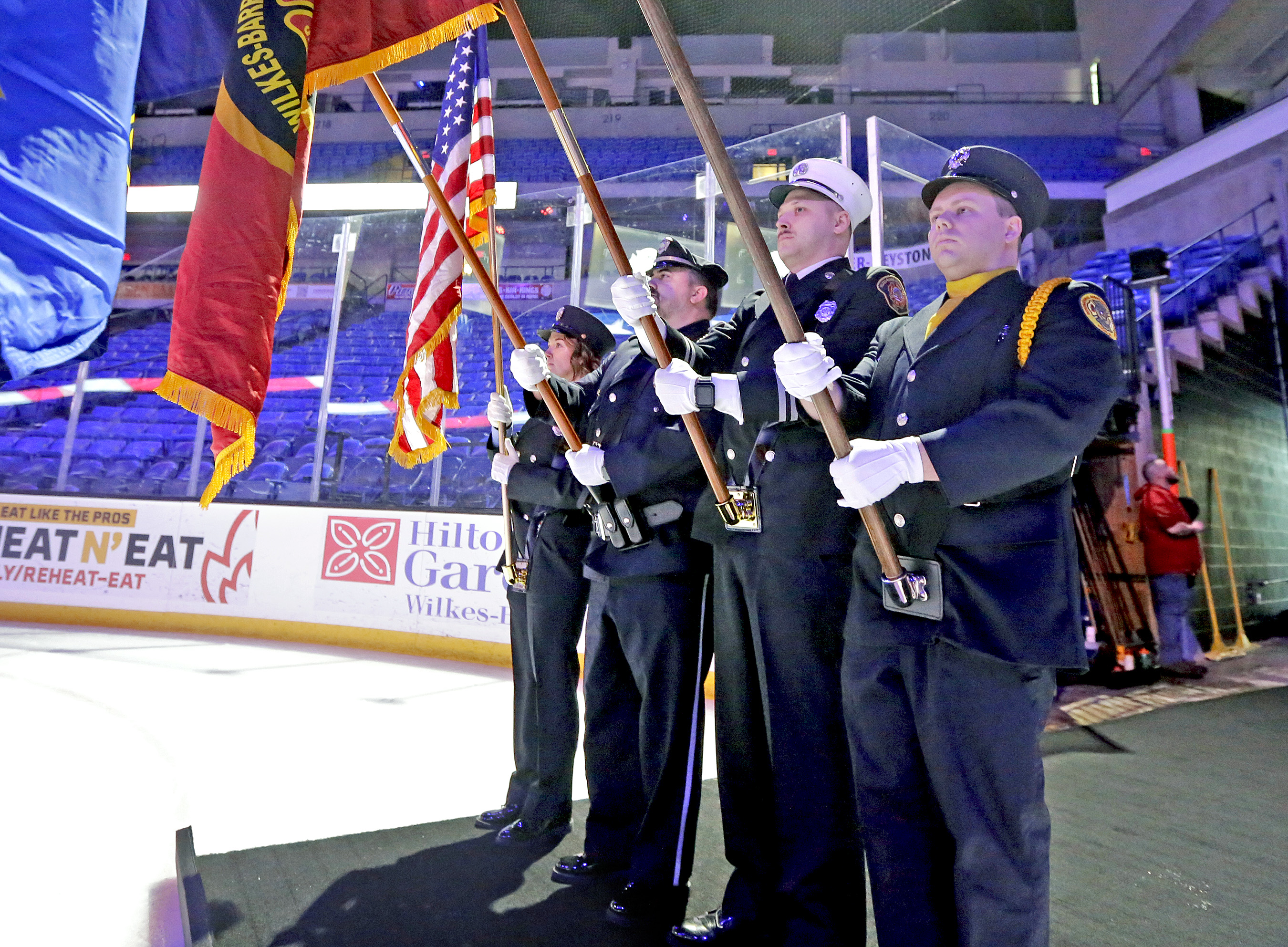 First responders from Wilkes-Barre and Scranton serve as the honor...