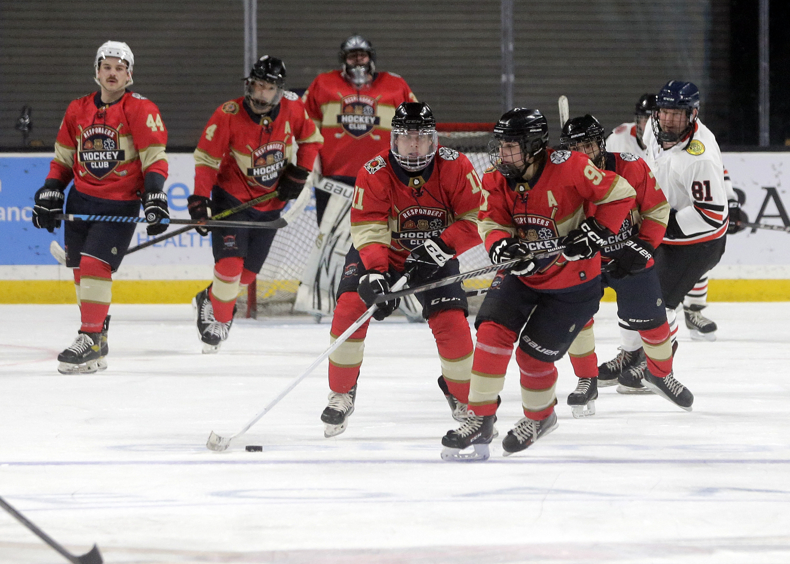 Wilkes-Barre’s Brian Ulrich (11) brings the puck down the ice...