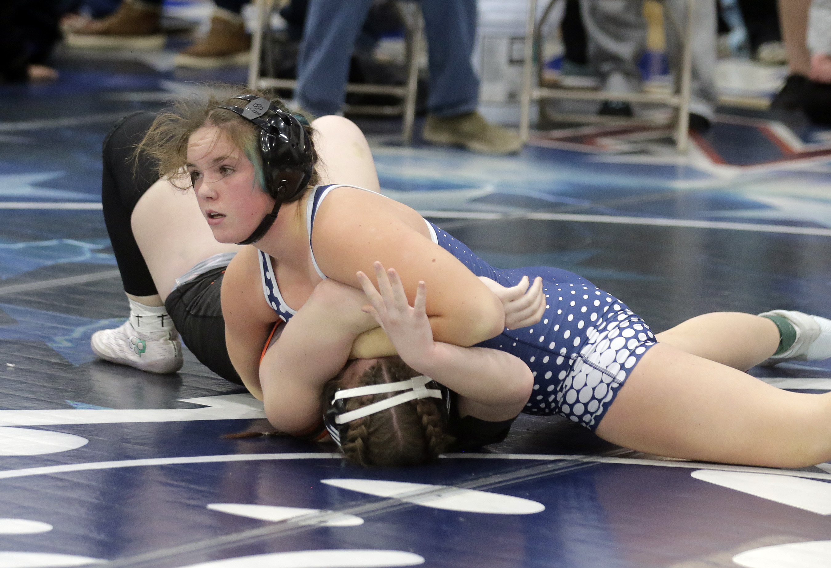 Abington Heights’ Hayden Manning, top, pins Towanda’s Elizabeth Naughton in...