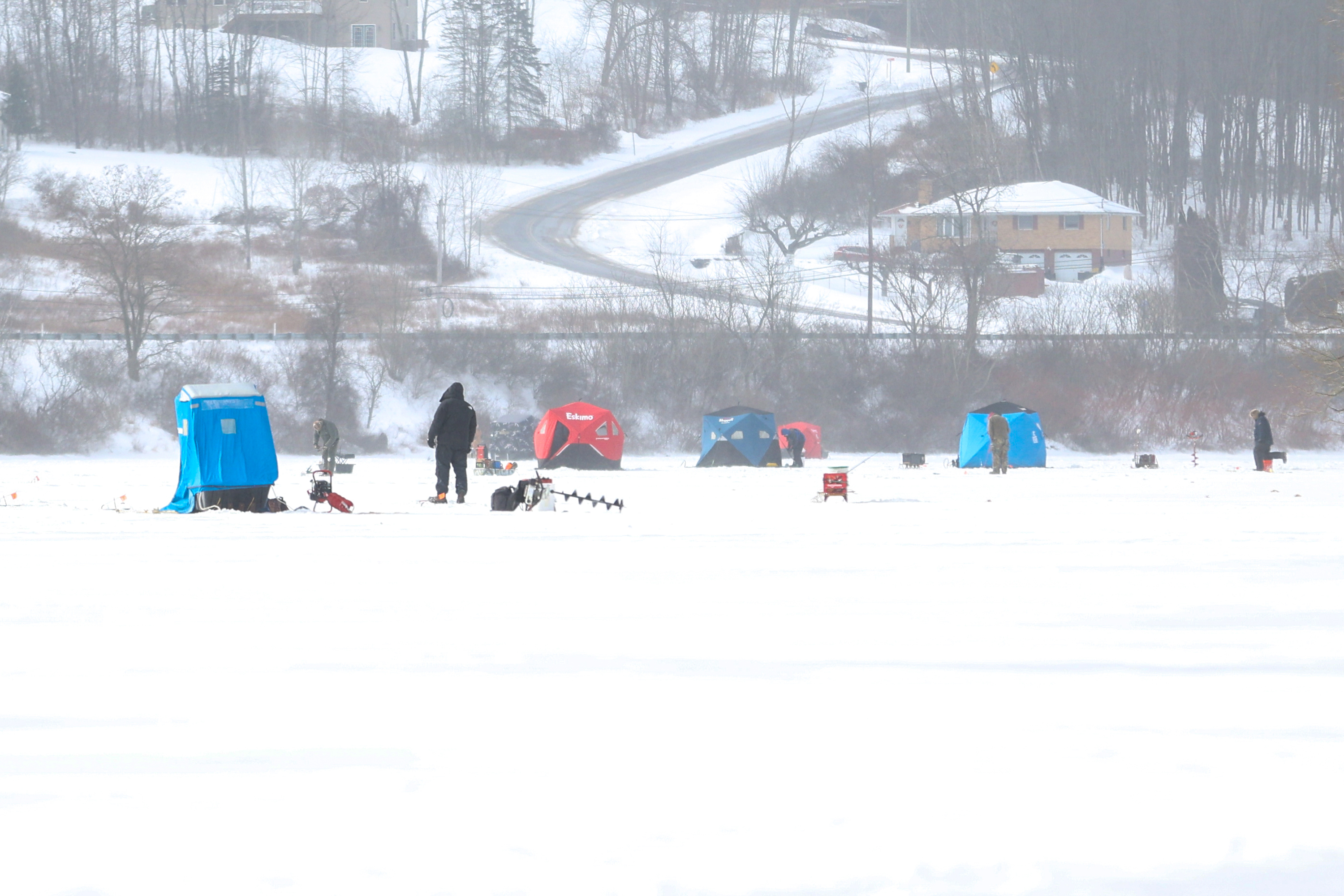 Ice fishers participate in the Nanticoke Conservation Club ice fishing...