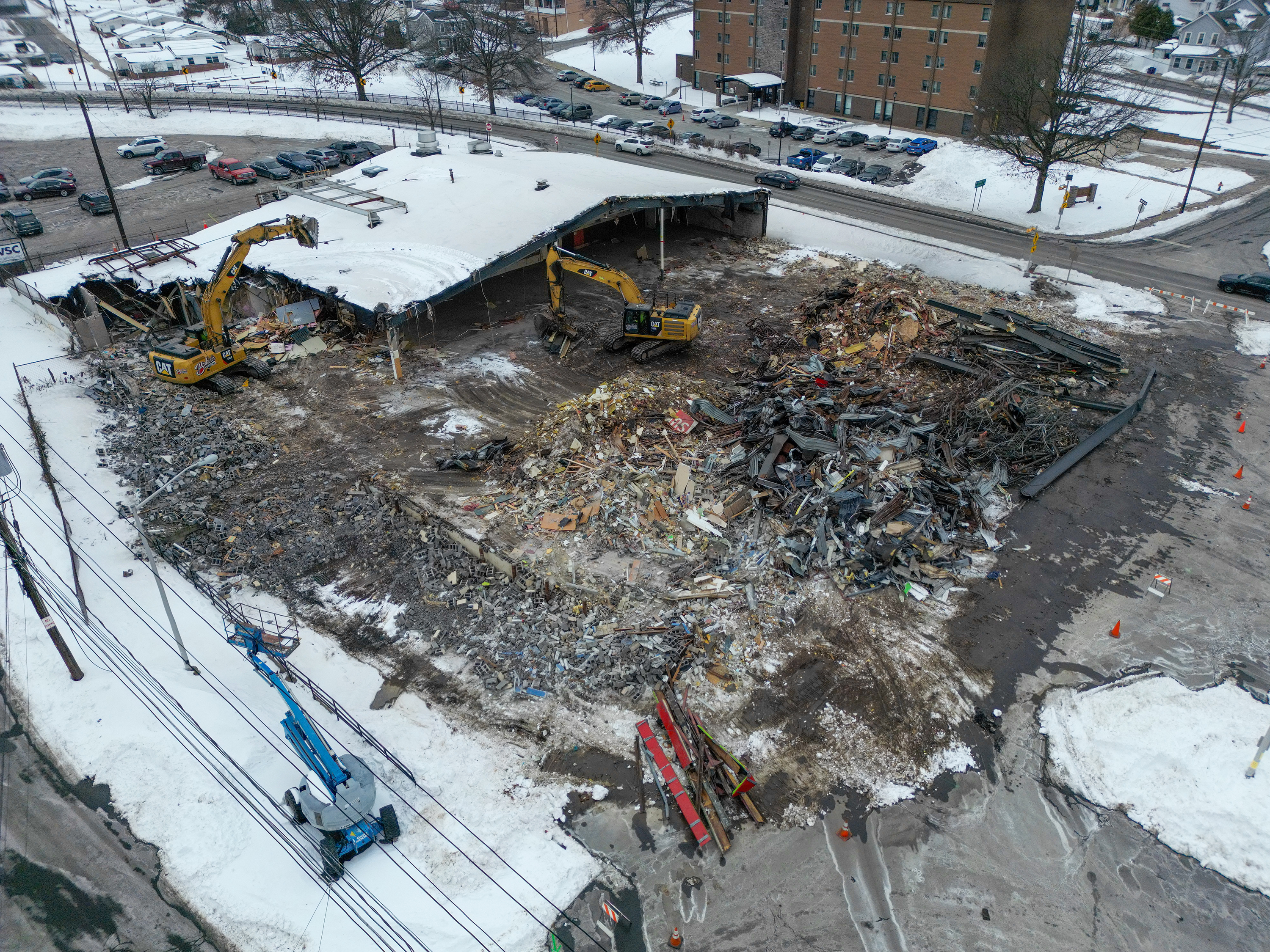 Two cranes demolish the former Quinn’s Supermarket in Pittston on...