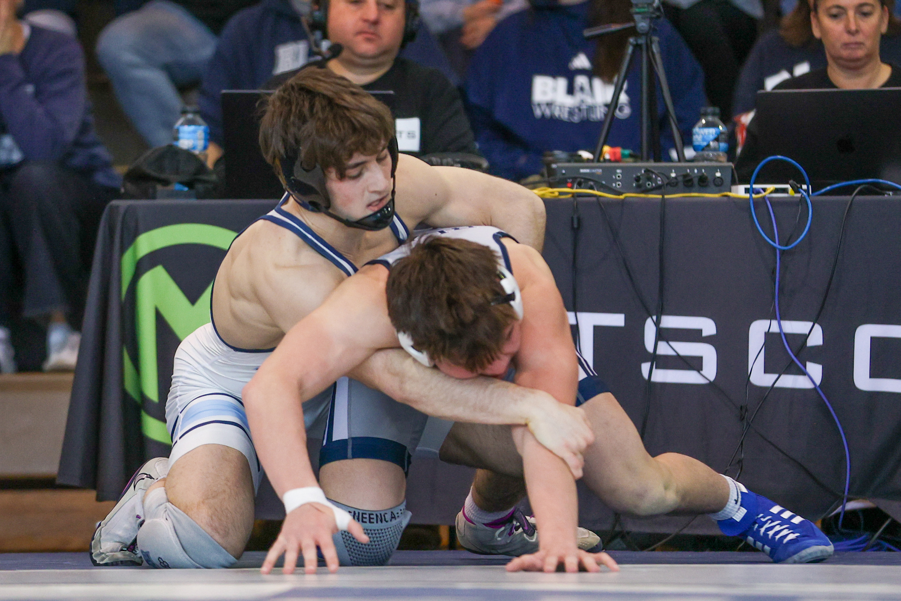 Wyoming Seminary’s Michael Turi holds down Blair Academy’s Ben Koch...