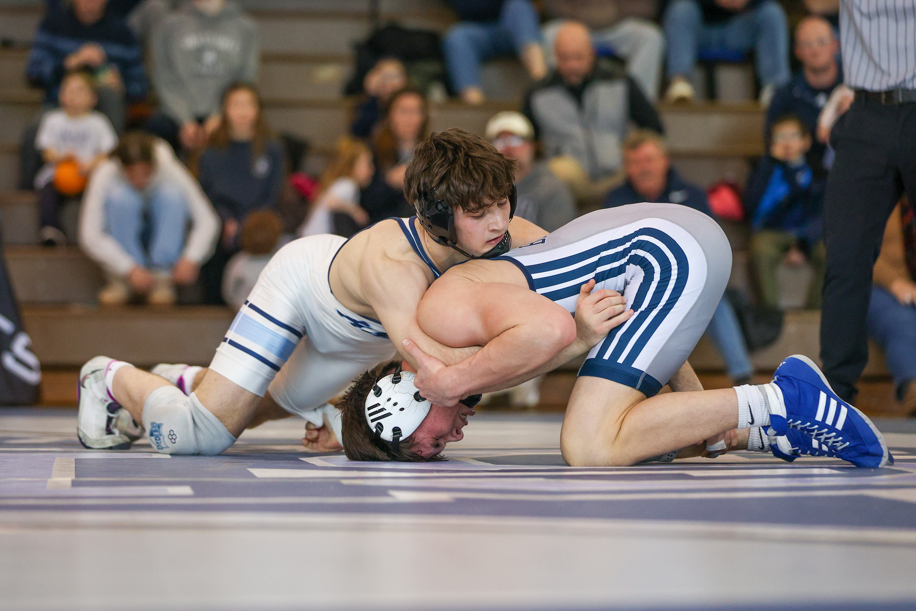 Wyoming Seminary’s Michael Turi holds down Blair Academy’s Ben Koch...