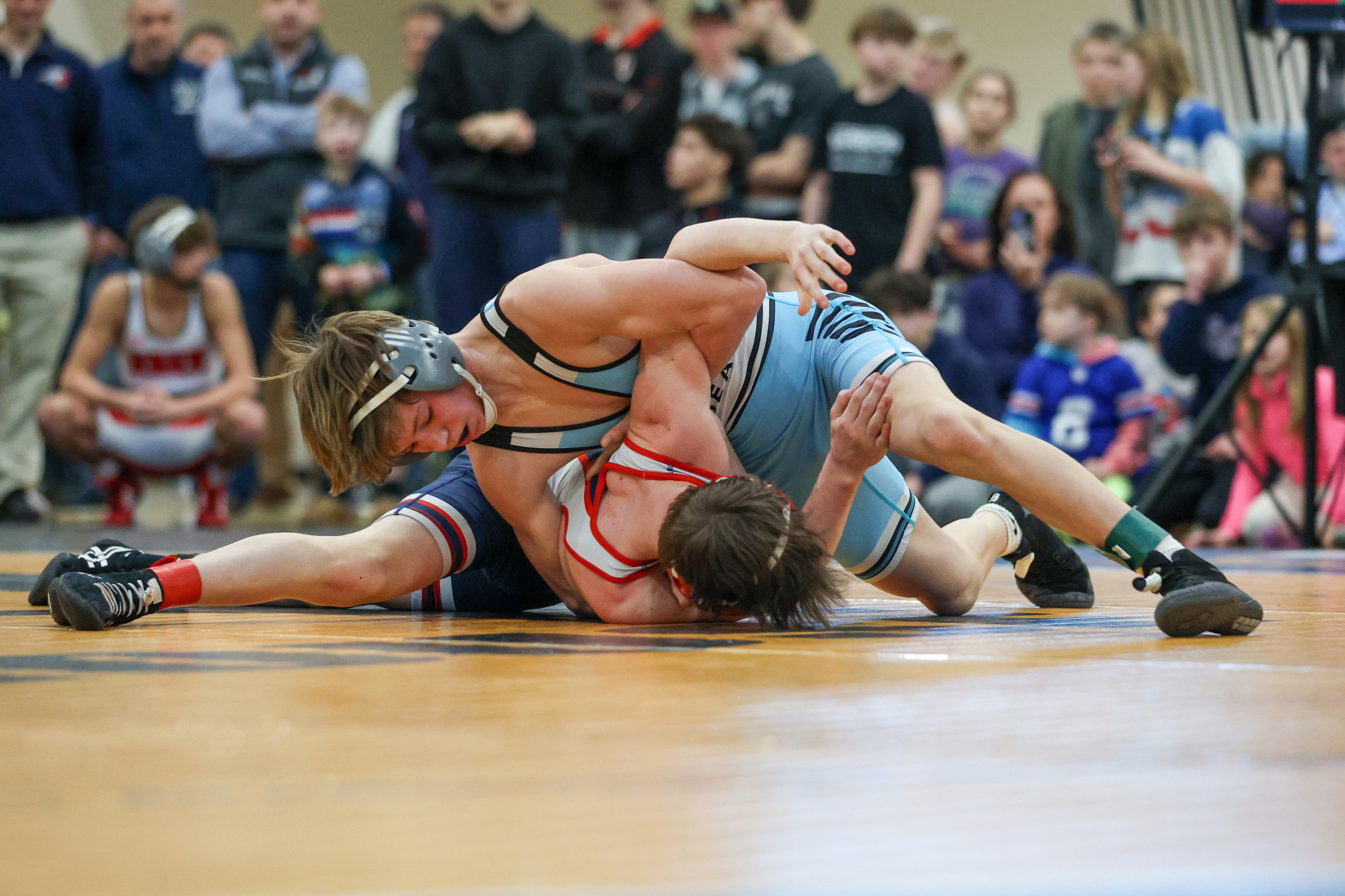 Wilkes-Barre Area’s James McKeown wrestles Pittston Area’s David Krantz during...