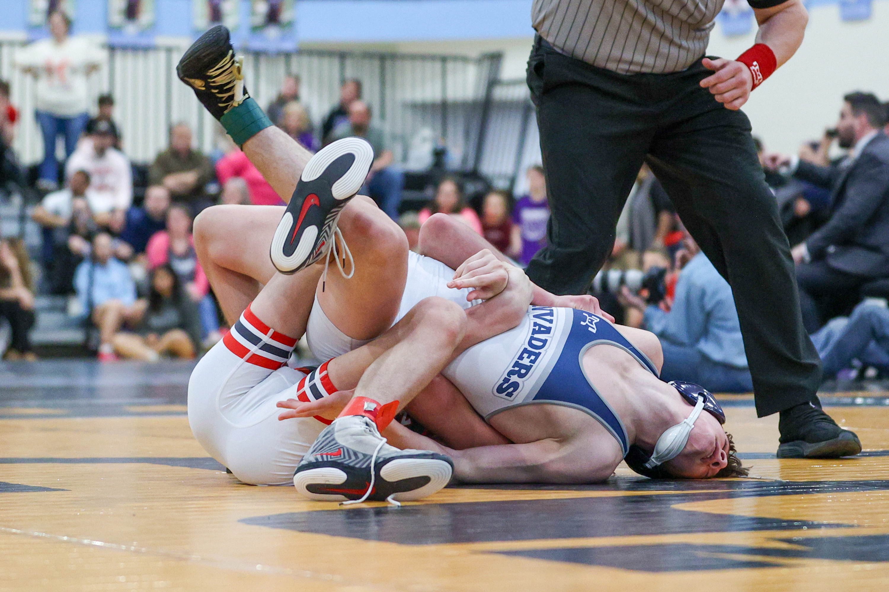 Hazleton Area’s Jake Benyo wrestles West Scranton’s Santino Aniska during...