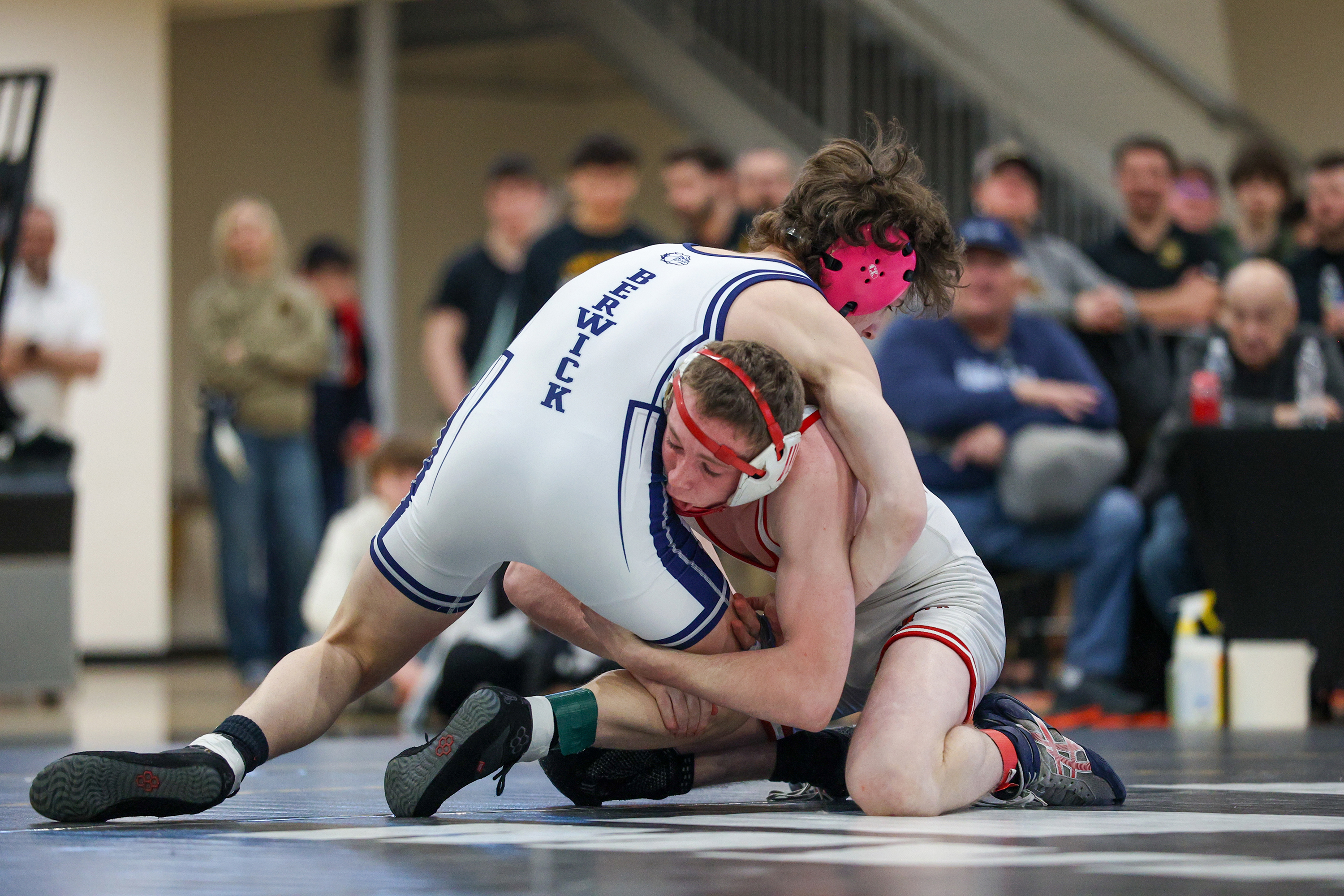 Berwick’s Carmen Malt wrestles Honesdale’s Brody Walsh during the PIAA...