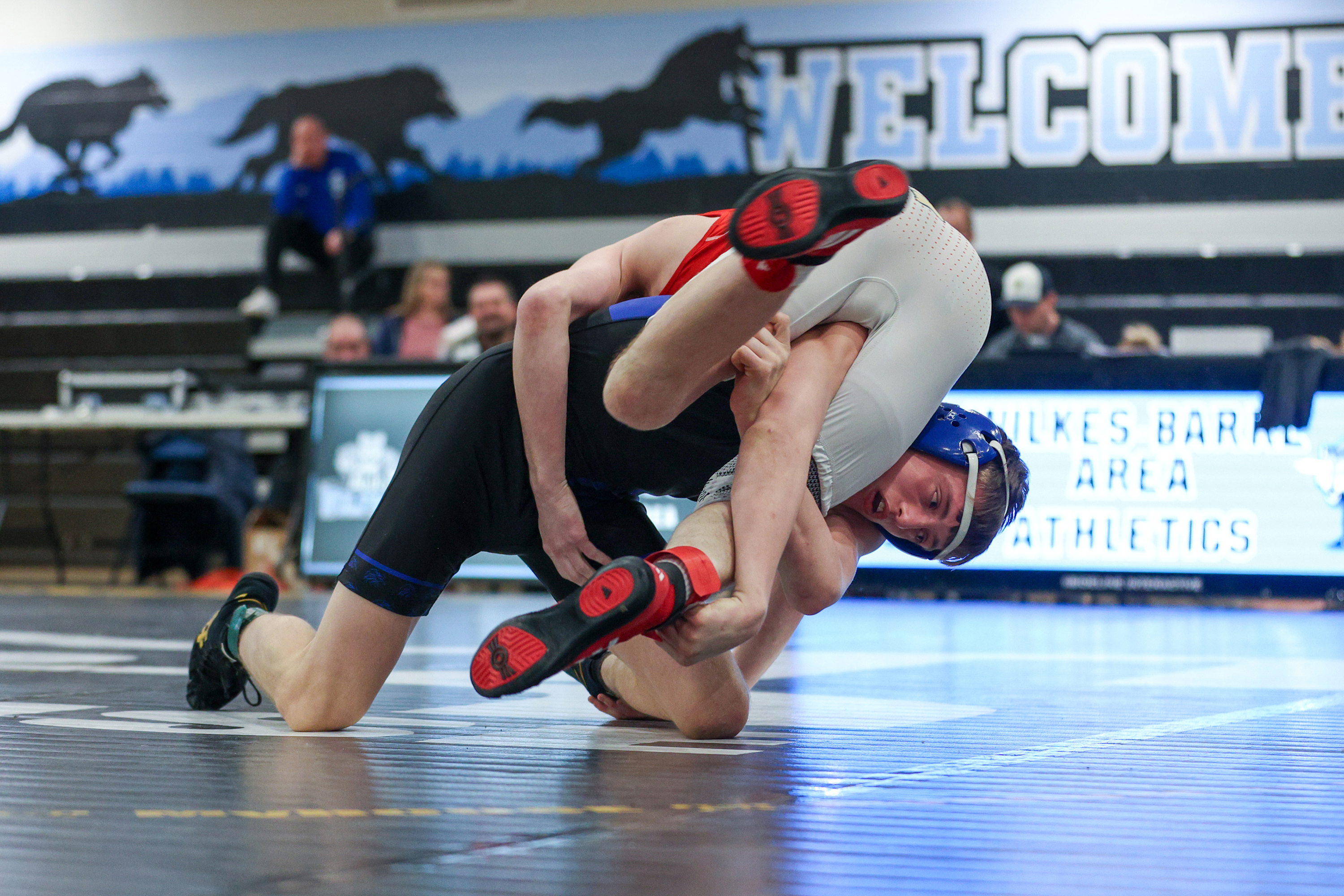 Hanover Area’s CJ Caines wrestles Blue Ridge’s Brice Woodruff during...