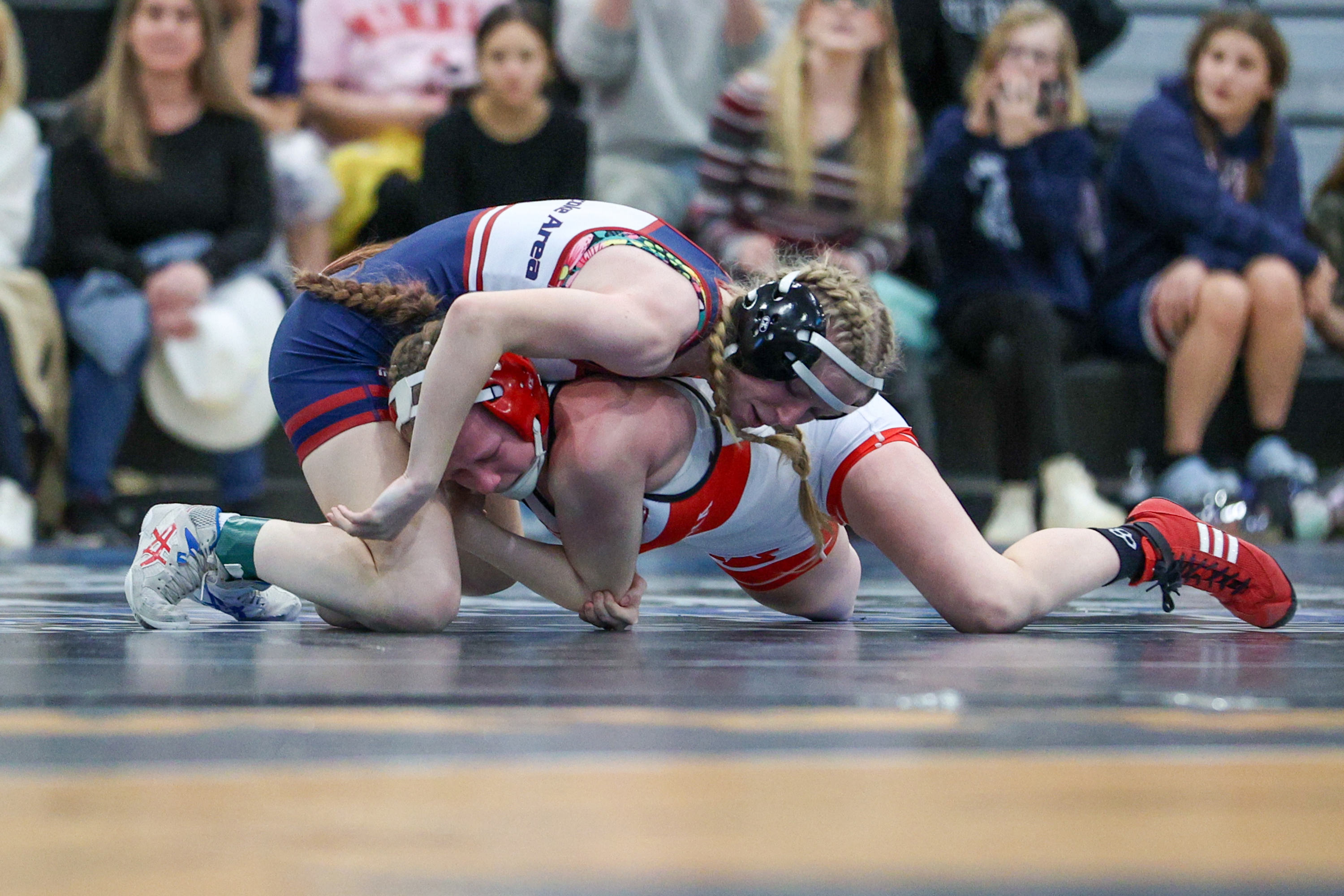 Nanticoke’s Matilda Serrano wrestles Lackawanna Trail’s Cidney Schaffer during the...