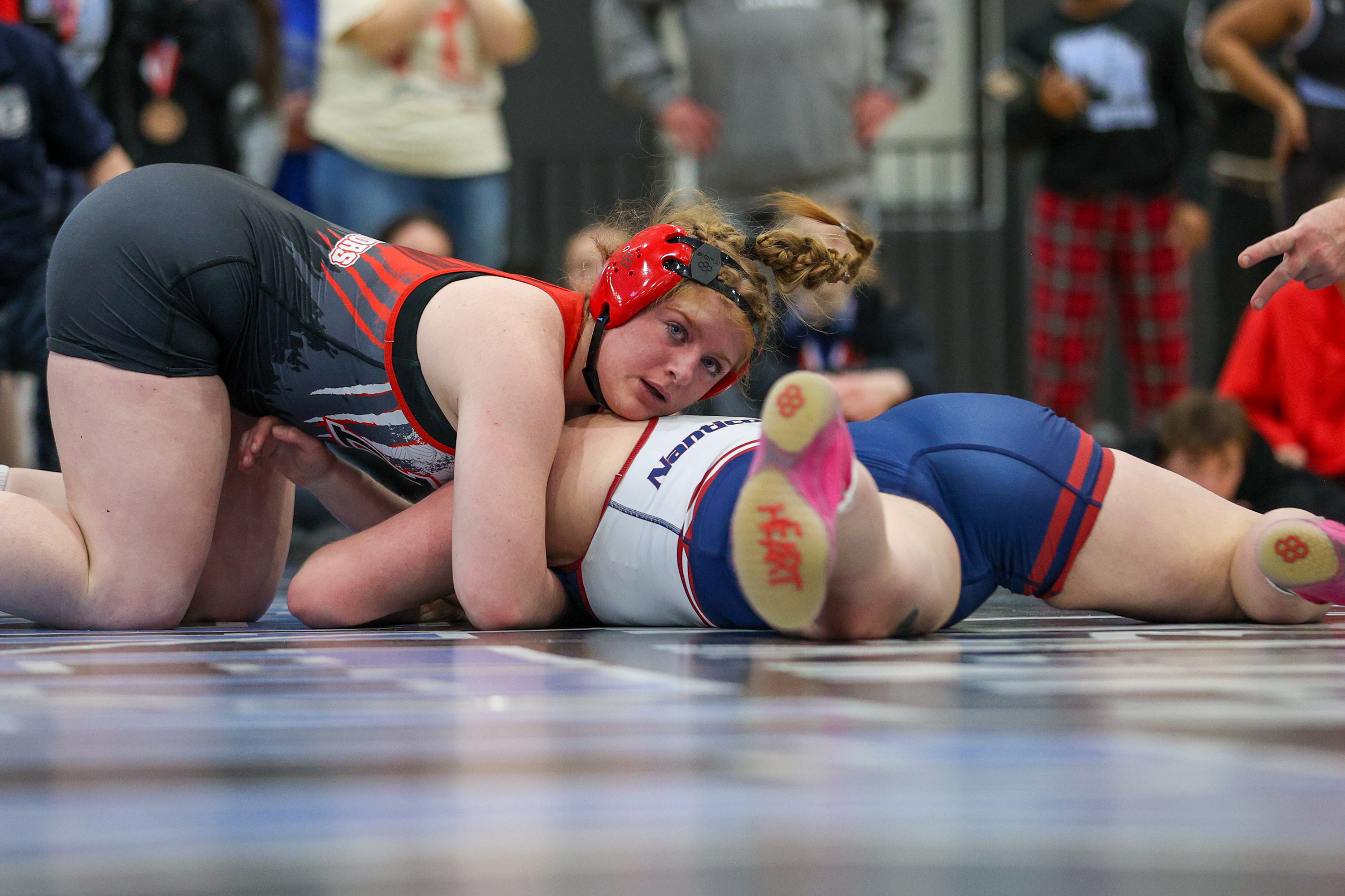 Delaware Valley’s Kate Prior holds down Nanticoke’s Sierra Ripka during...