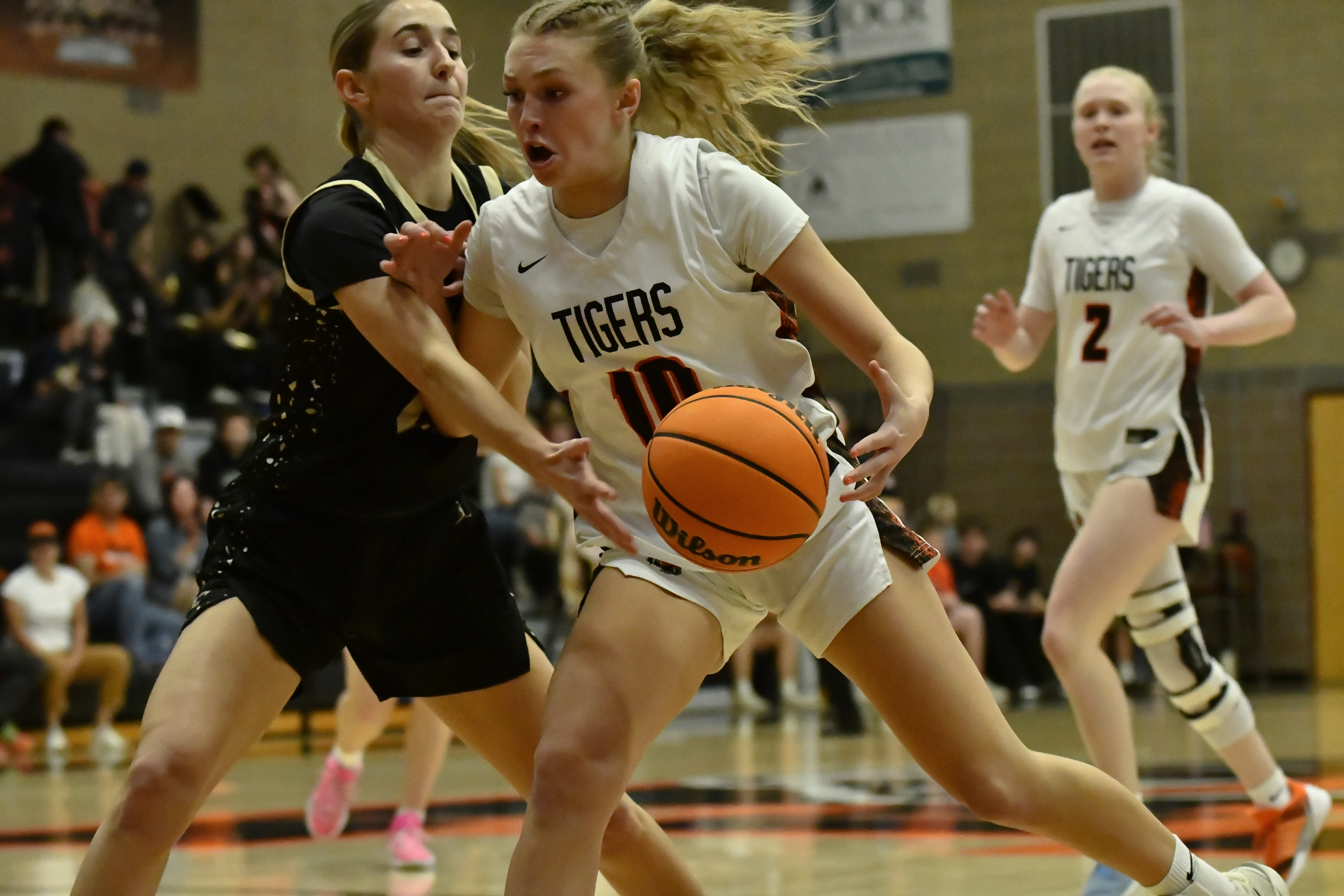 Erie’s Juliet Slater looks for a path to the basket...