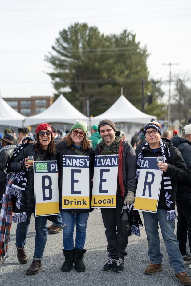 Friends celebrate their love of craft, artisan beer in Kennett Square on Feb. 22. (COURTESY OF KENNETT COLLABORATIVE / PHOTO BY JOSH CASE)