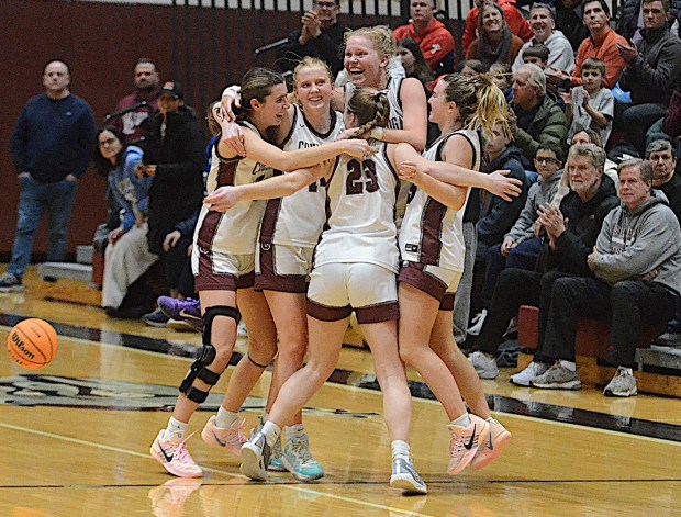 Conestoga celebrates the Central League championship after defeating Haverford 59-43 at Lower Merion Tuesday night. (PETE BANNAN/MediaNews Group)