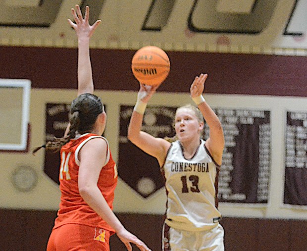 Conestoga's Ryann Jennings fires a shot over Haverford's Maura Gilroy Tuesday at Lower Merion. (PETE BANNAN/MediaNews Group)