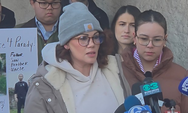 Parady La's wife, Meghan Morgan, said he was a devoted family man who was a provider, caregiver and protector (ALEX ROSE -DAILY TIMES)