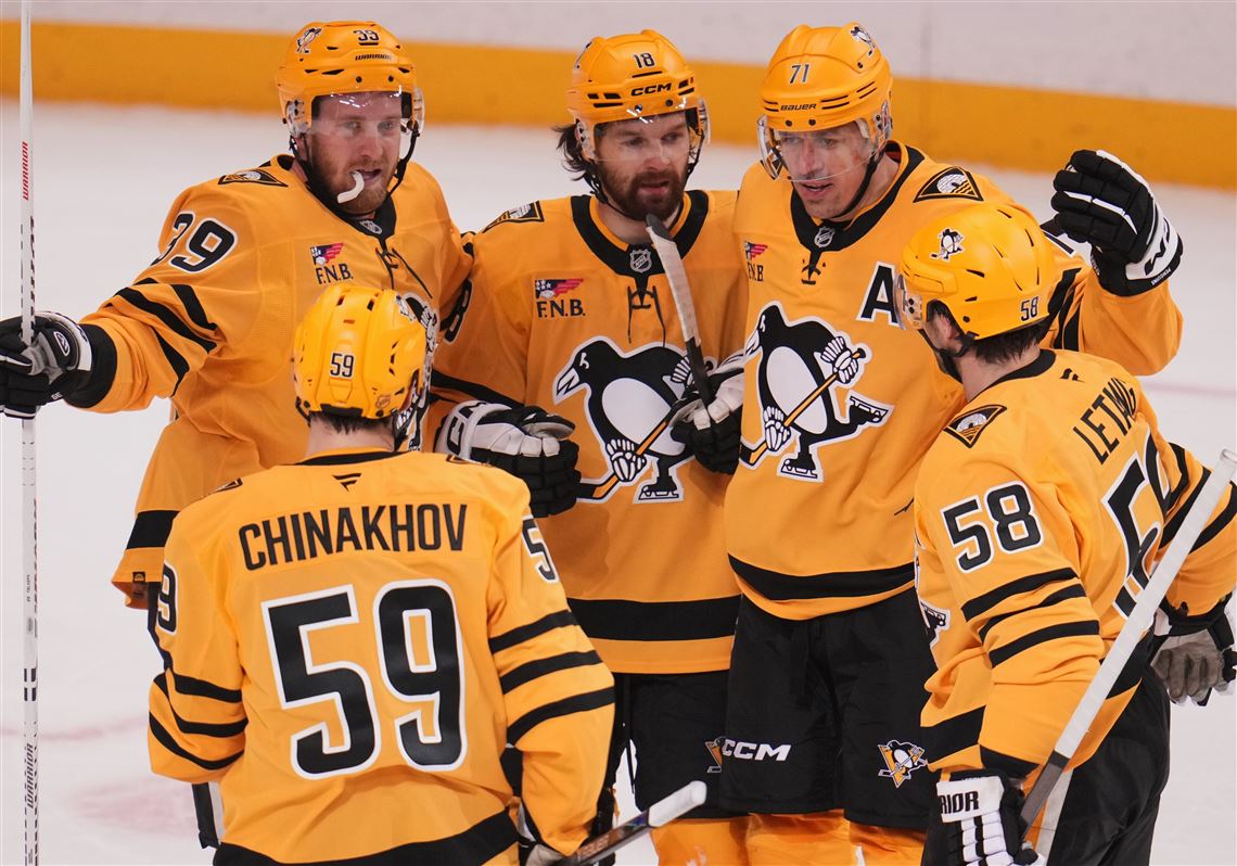 Penguins top Devils in first game following Olympic break