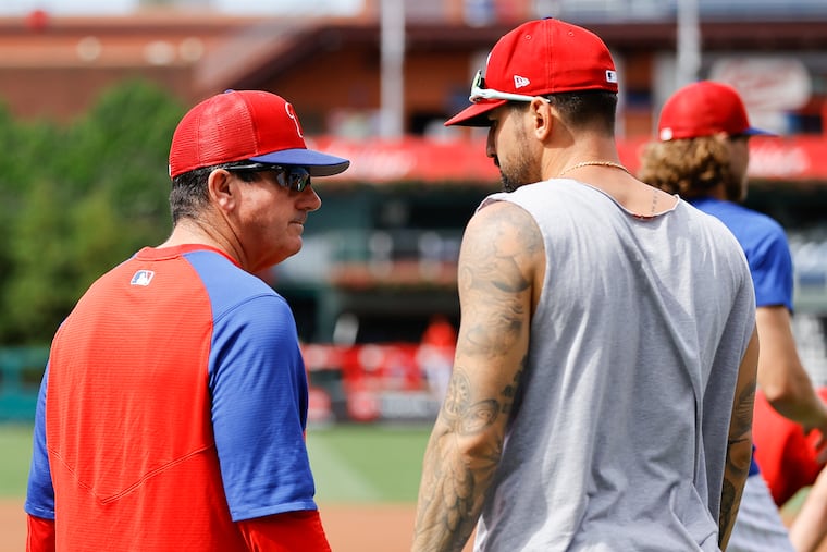 Phillies manager Rob Thomson (left) said Friday of former Phillie Nick Castellanos, "I wish him all the best."