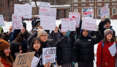 Young people hold up signs during history lesson and protest at the President's House Site, Independence National Historical Park, Philadelphia, Friday, Feb. 6, 2026. They are protesting the removal of the slavery exhibit at this site.