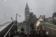 PHILADELPHIA, PENNSYLVANIA - FEBRUARY 22: Philadelphians brave heavy wind and snow in center city as a winter storm hit in the afternoon turning rain into heavy snow on February 22, 2026 in Philadelphia, Pennsylvania. Philadelphians are preparing for a sever winter storm that is expected to bring up to two feet of snow and high winds. (Photo by Matthew Hatcher/Getty Images)