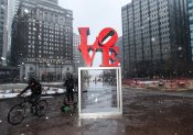 PHILADELPHIA, PENNSYLVANIA - FEBRUARY 22: Philadelphians brave heavy wind and snow in center city as a winter storm hit in the afternoon turning rain into heavy snow on February 22, 2026 in Philadelphia, Pennsylvania. Philadelphians are preparing for a sever winter storm that is expected to bring up to two feet of snow and high winds. (Photo by Matthew Hatcher/Getty Images)