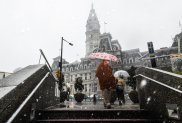 PHILADELPHIA, PENNSYLVANIA - FEBRUARY 22: Philadelphians brave heavy wind and snow in center city as a winter storm hit in the afternoon turning rain into heavy snow on February 22, 2026 in Philadelphia, Pennsylvania. Philadelphians are preparing for a sever winter storm that is expected to bring up to two feet of snow and high winds. (Photo by Matthew Hatcher/Getty Images)