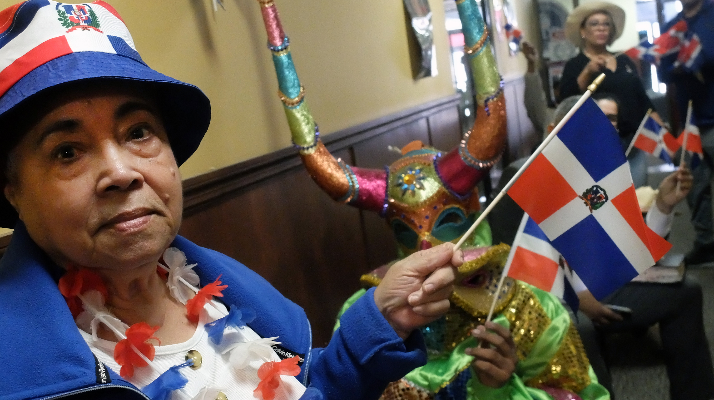 Altagracia Jimenez waves the Dominican Republic flag during the 182nd...