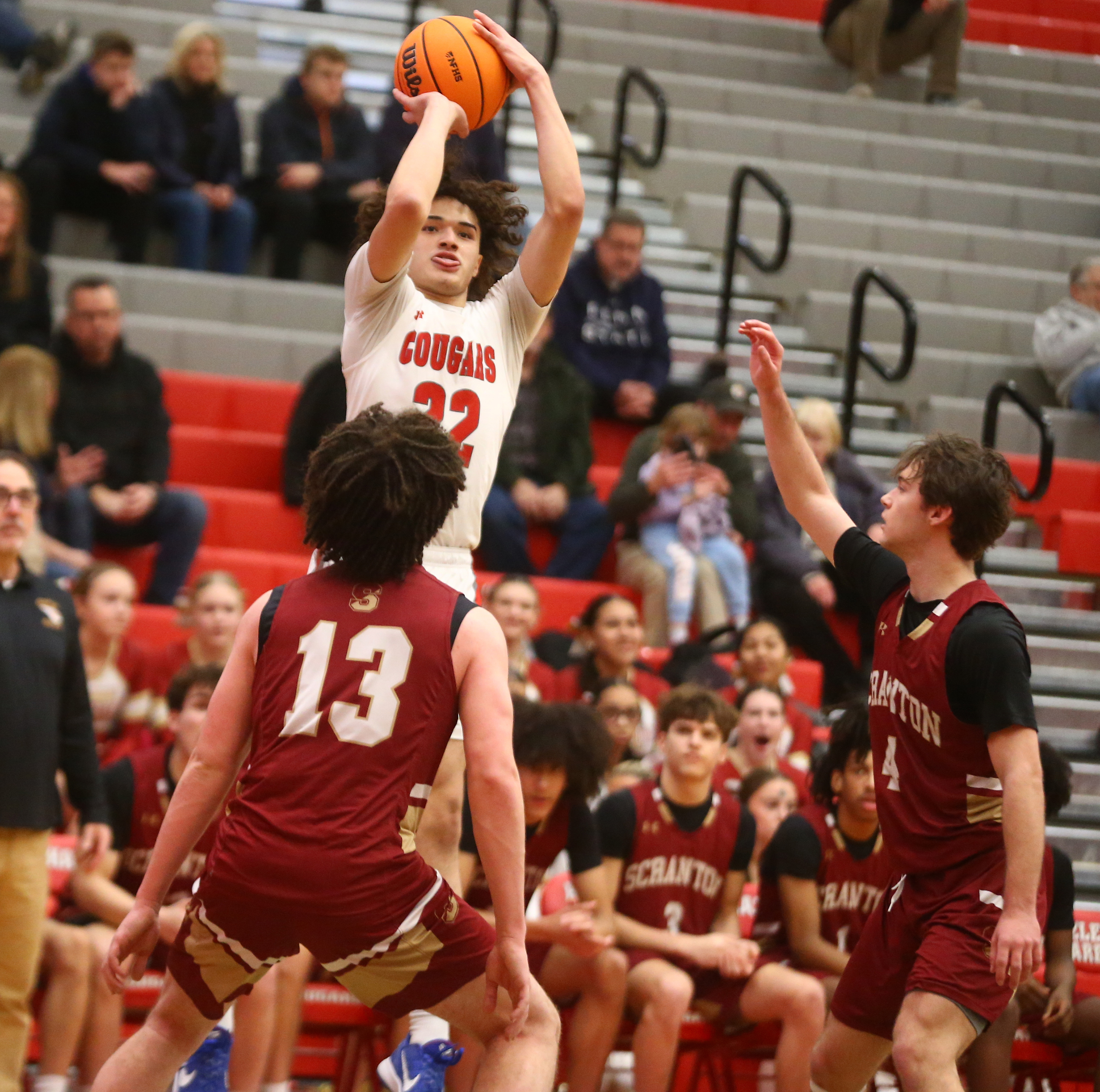 Hazleton Kendrick Ortiz (22) puts up a shot as Scranton...