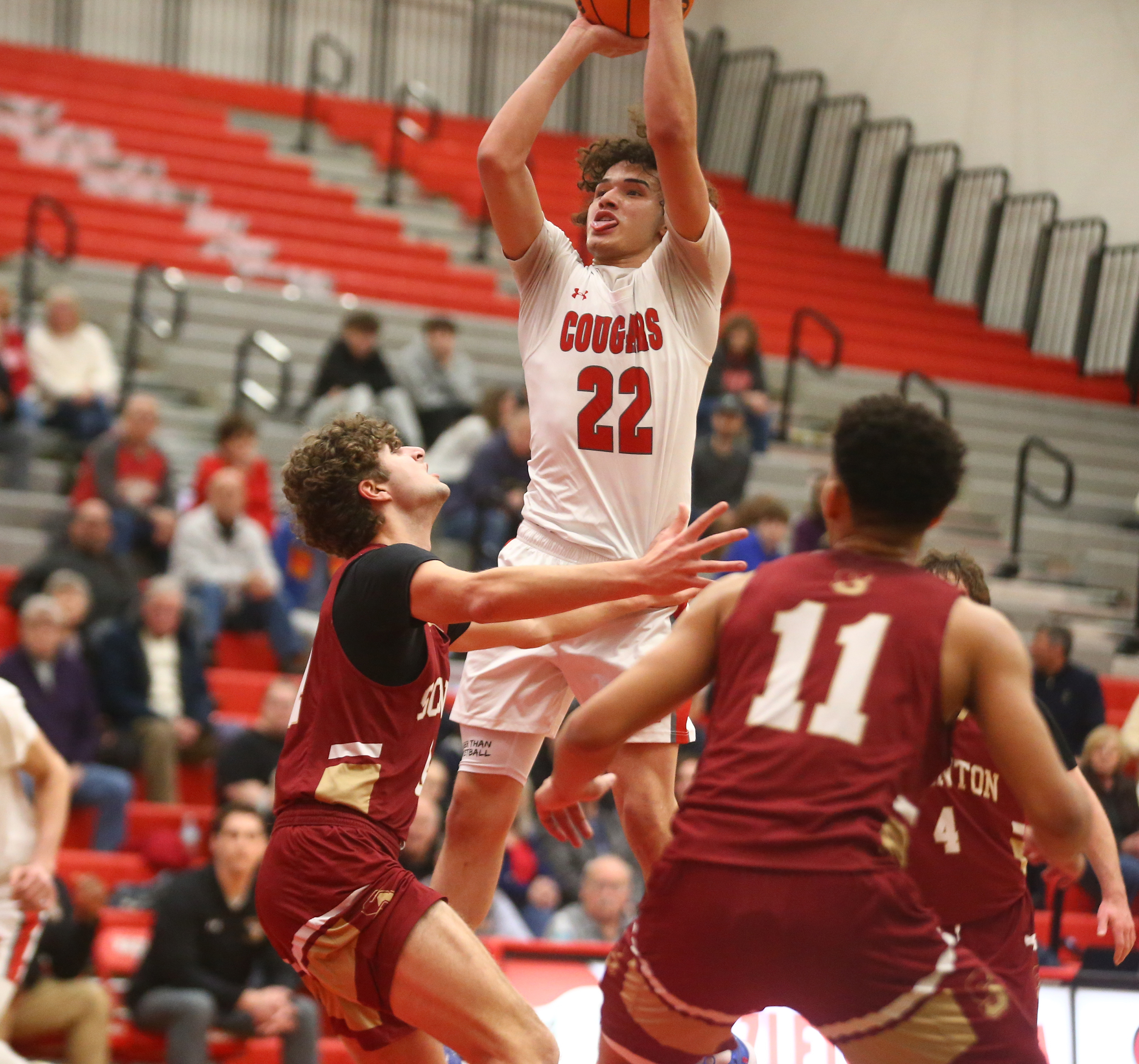 Hazleton Kendrick Ortiz (22) puts up a shot as Scranton...