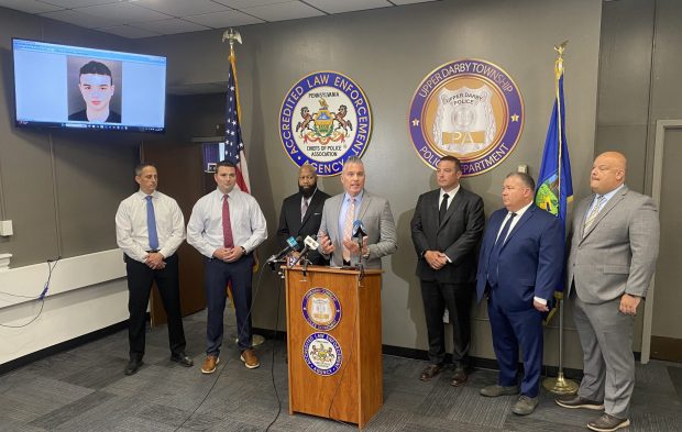 Upper Darby Police Superintendent Timothy Bernhardt at the microphone at a press conference. Bernhardt says "Our relationship with ICE is professional and work-related. While I would welcome more communication, limited information sharing has long been a challenge across law enforcement agencies and is not new." (PETE BANNAN - DAILY TIMES)